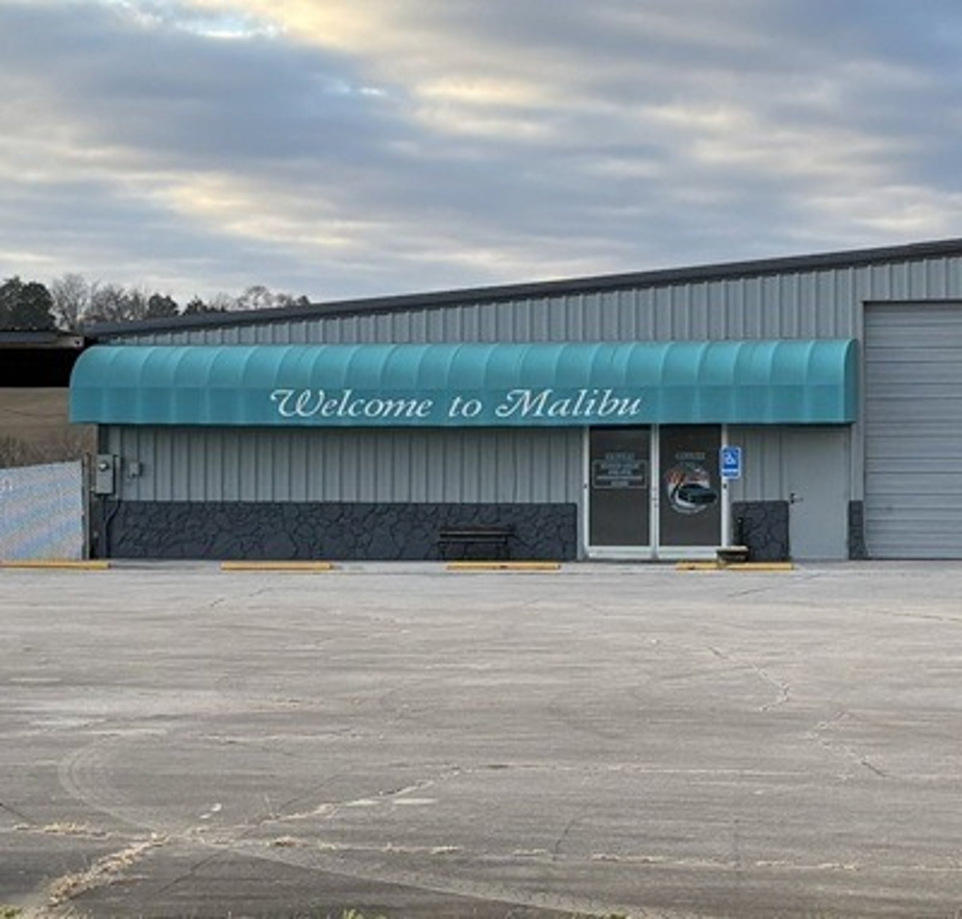black and brown leather padded tub sofa