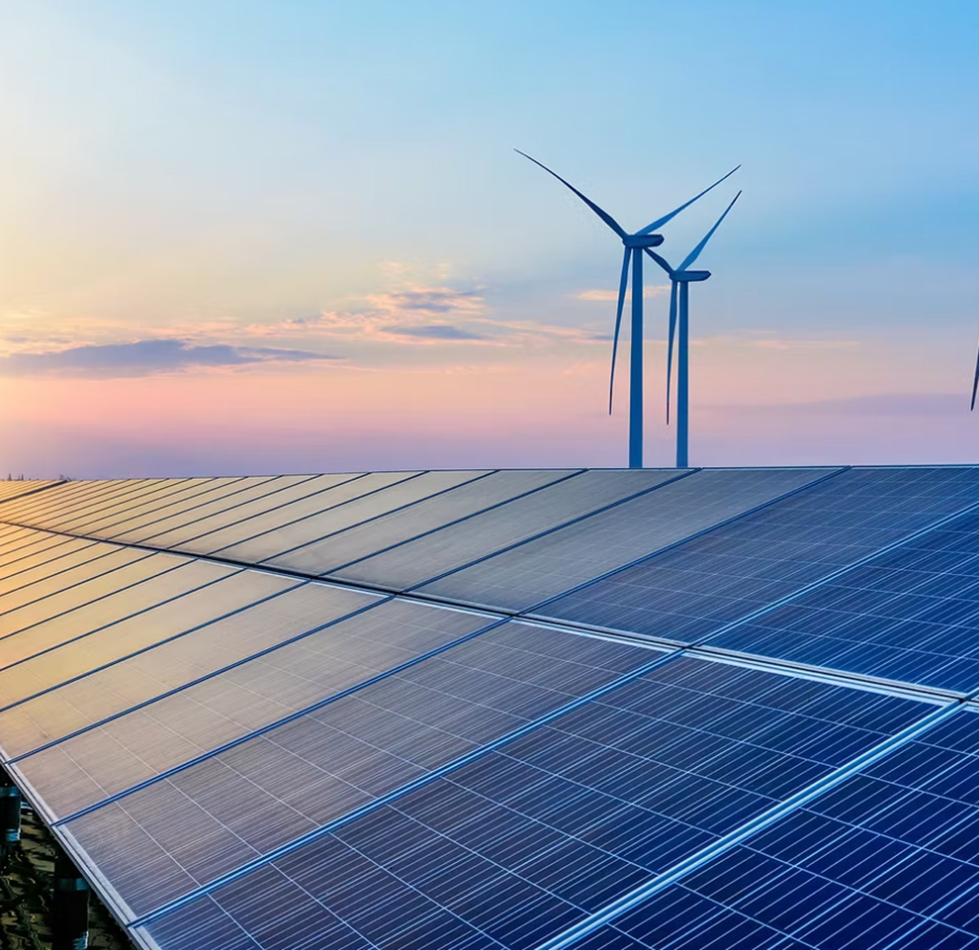 an abstract photo of a curved building with a blue sky in the background