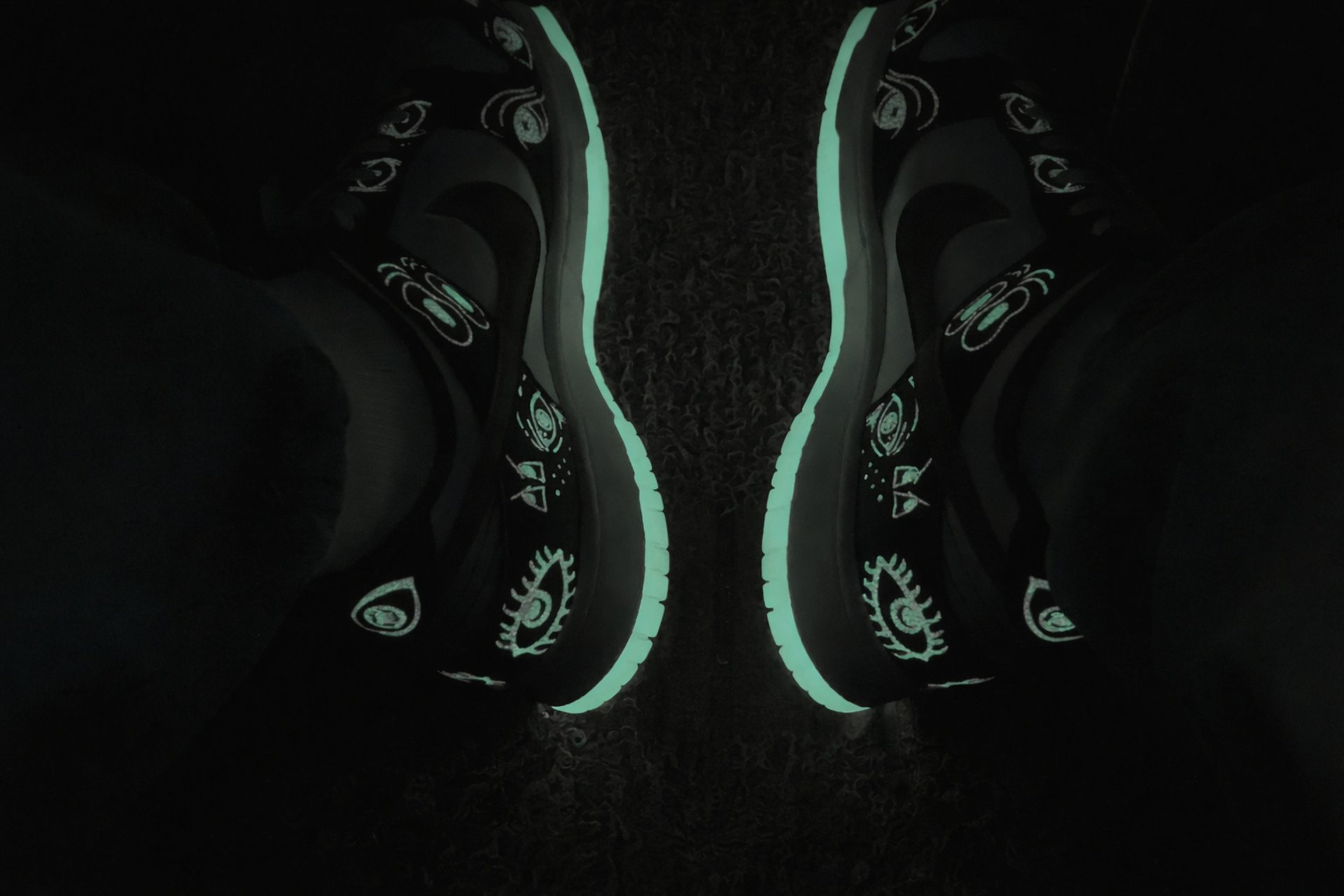 person in black pants and black shoes