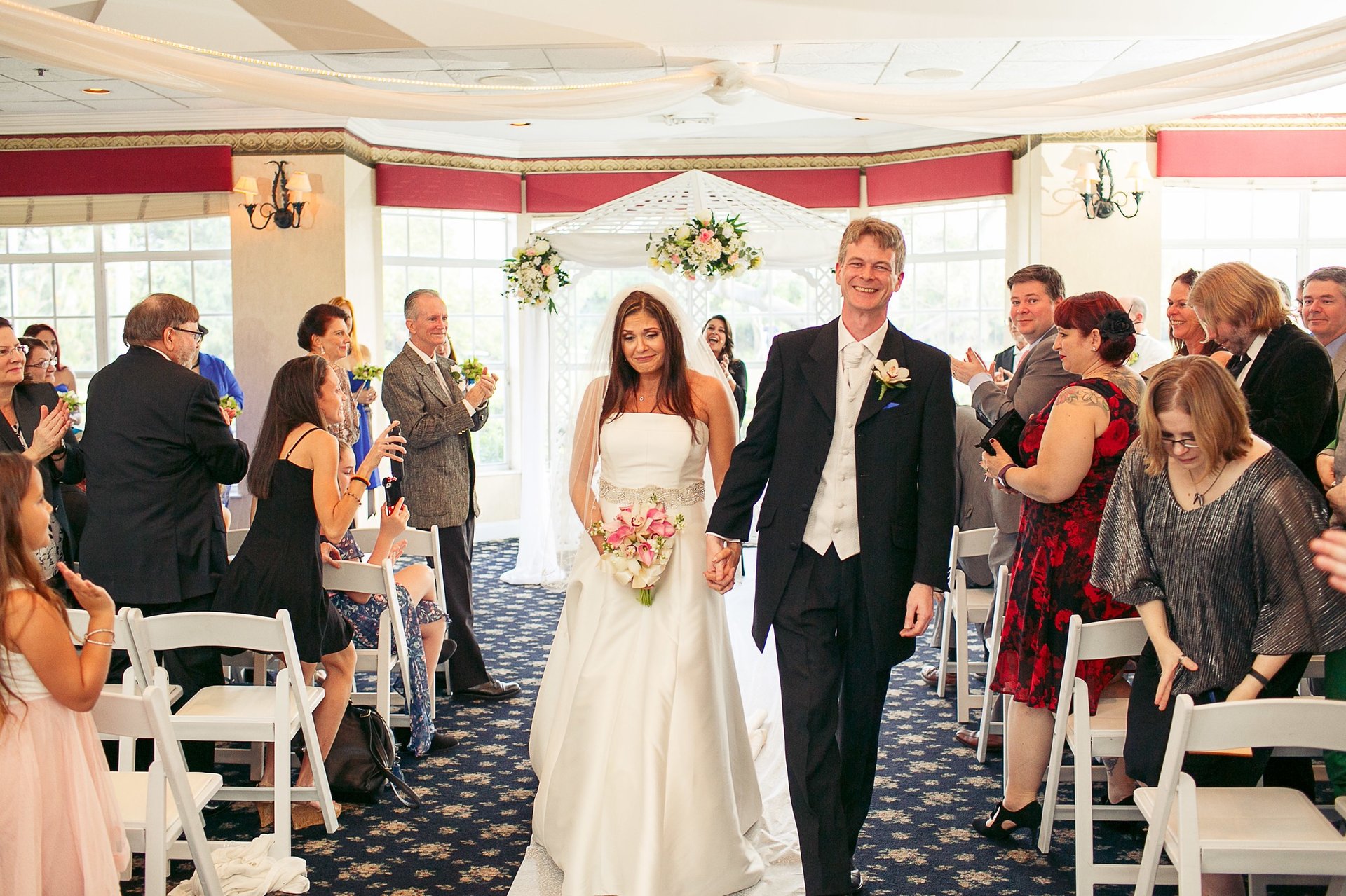 an abstract photo of a curved building with a blue sky in the background