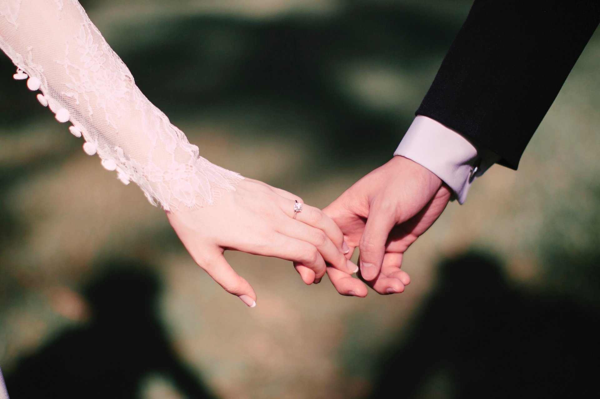 an abstract photo of a curved building with a blue sky in the background