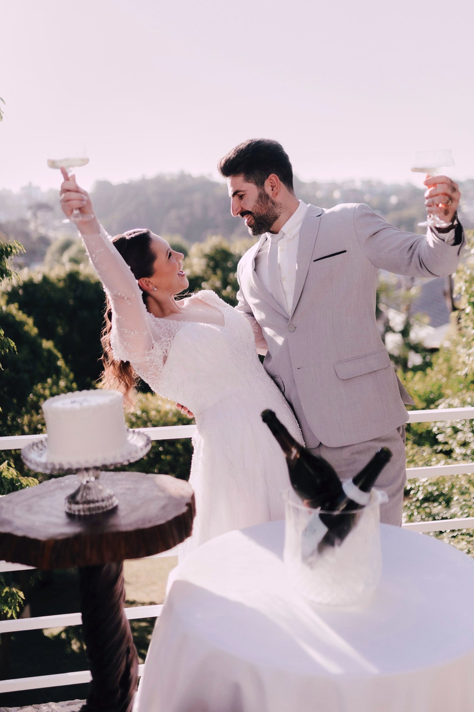 woman in white wedding gown holding bouquet of flowers