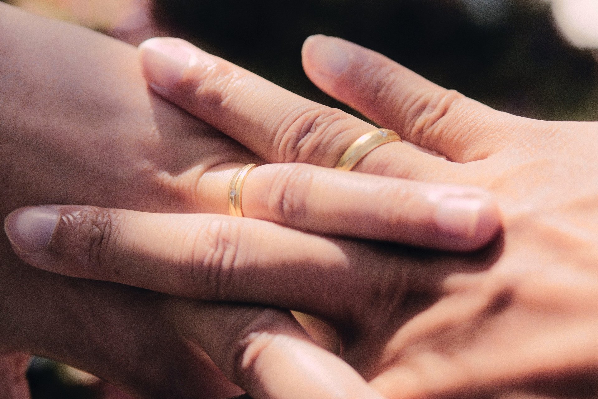 an abstract photo of a curved building with a blue sky in the background