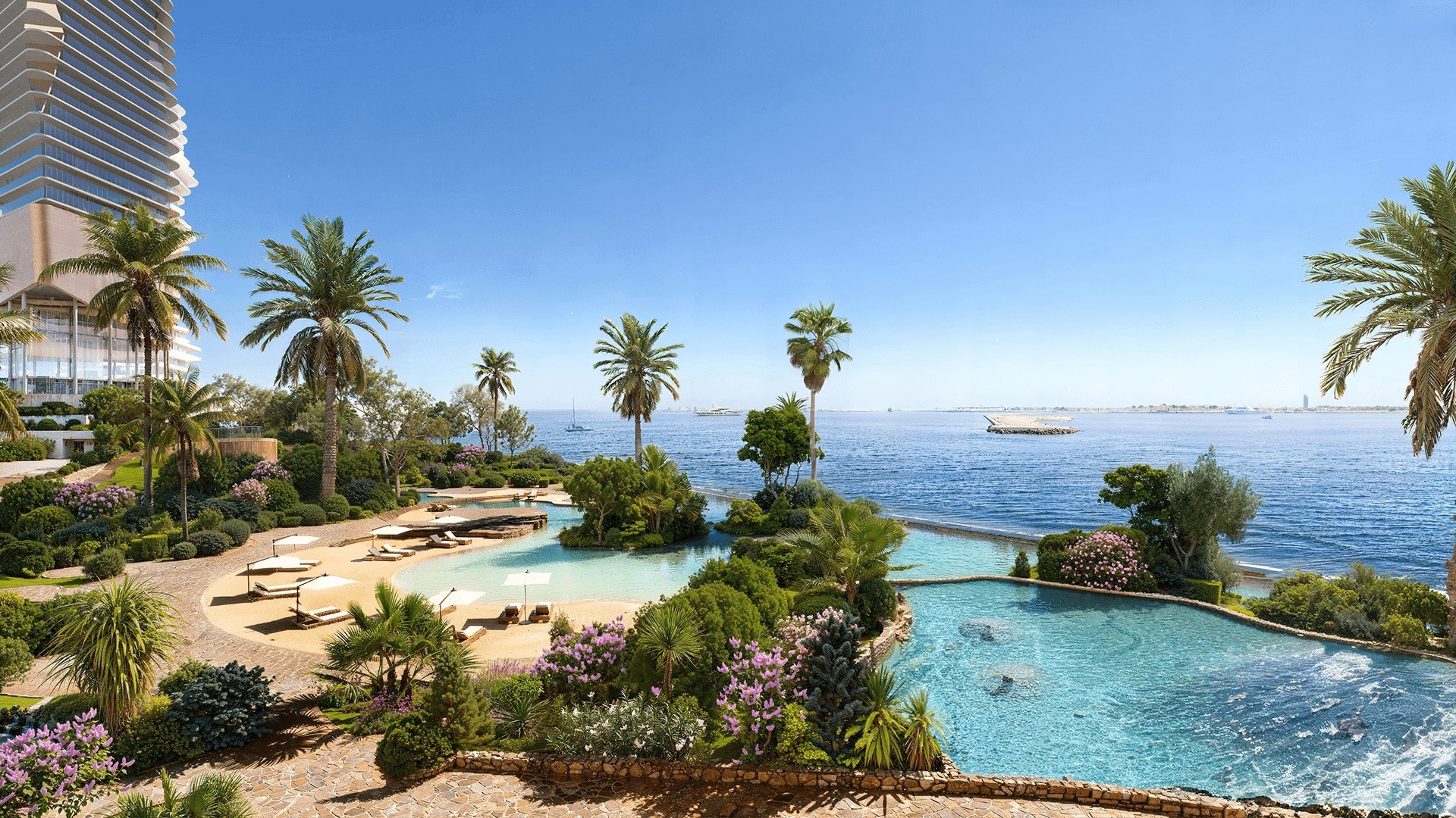 an abstract photo of a curved building with a blue sky in the background