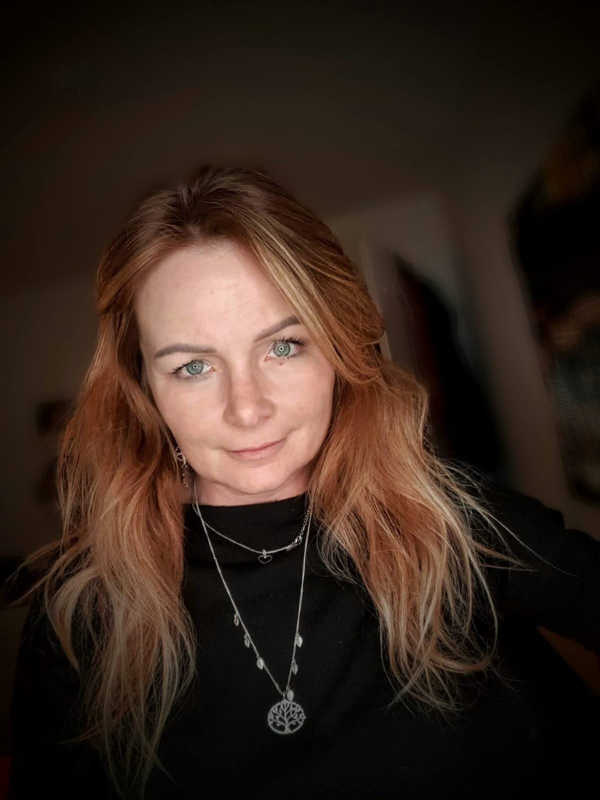 black and brown leather padded tub sofa