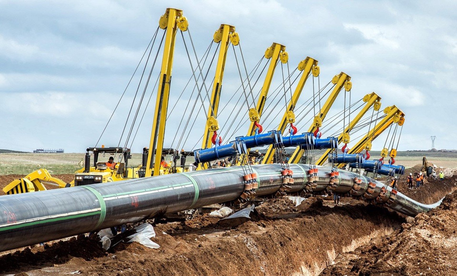 a close up of a black and brown abstract painting