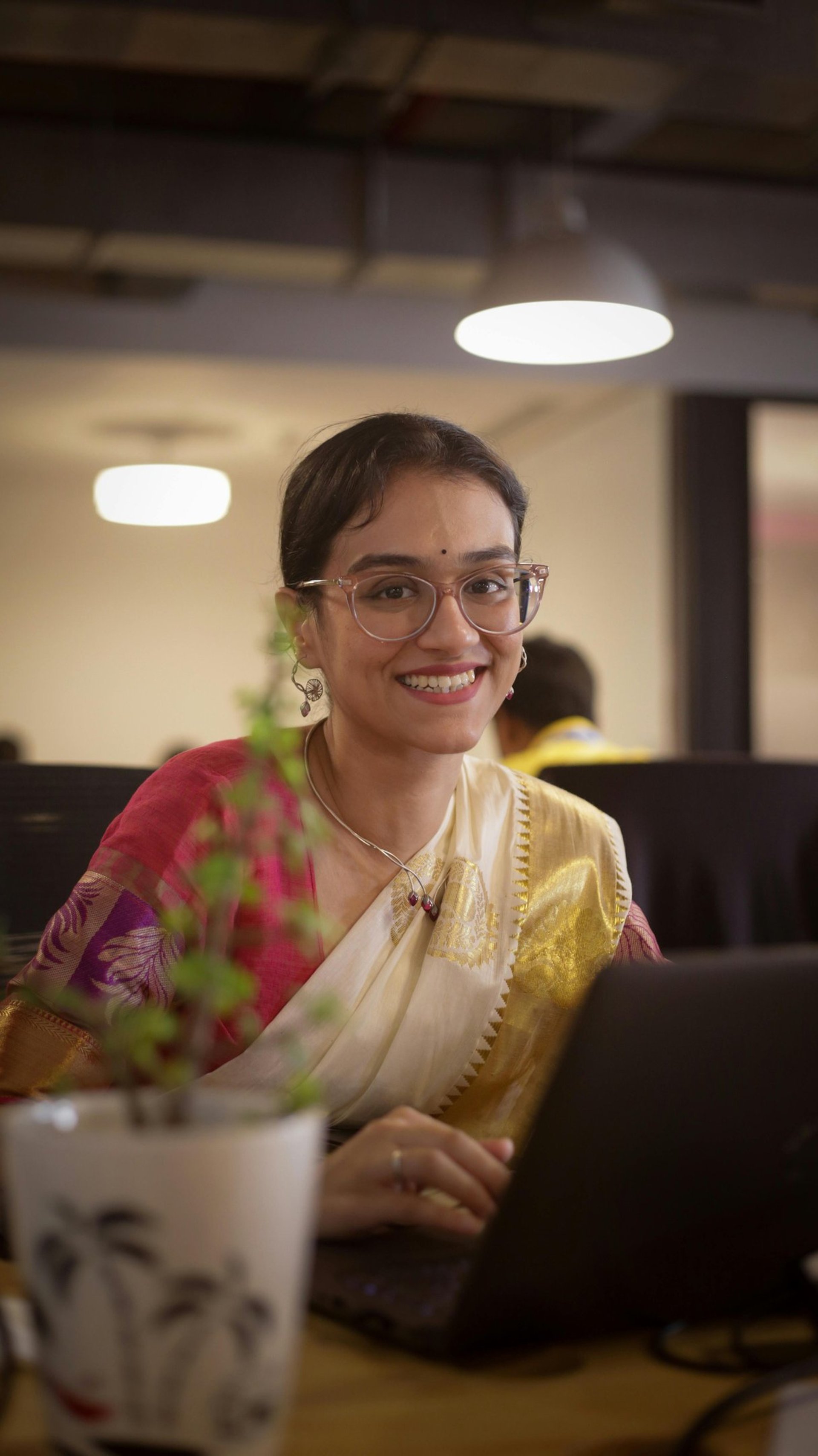 woman wearing yellow long-sleeved dress under white clouds and blue sky during daytime