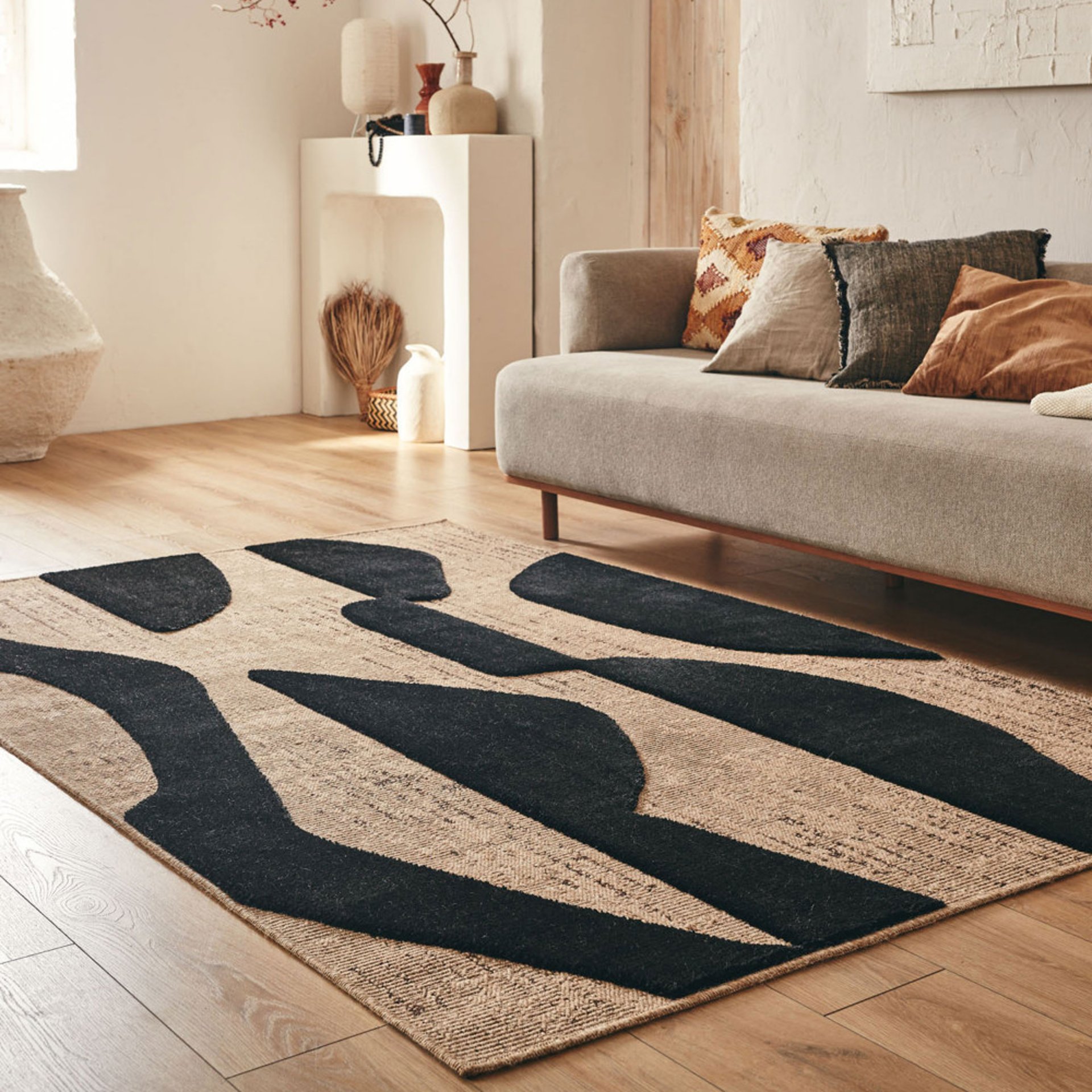 an abstract photo of a curved building with a blue sky in the background