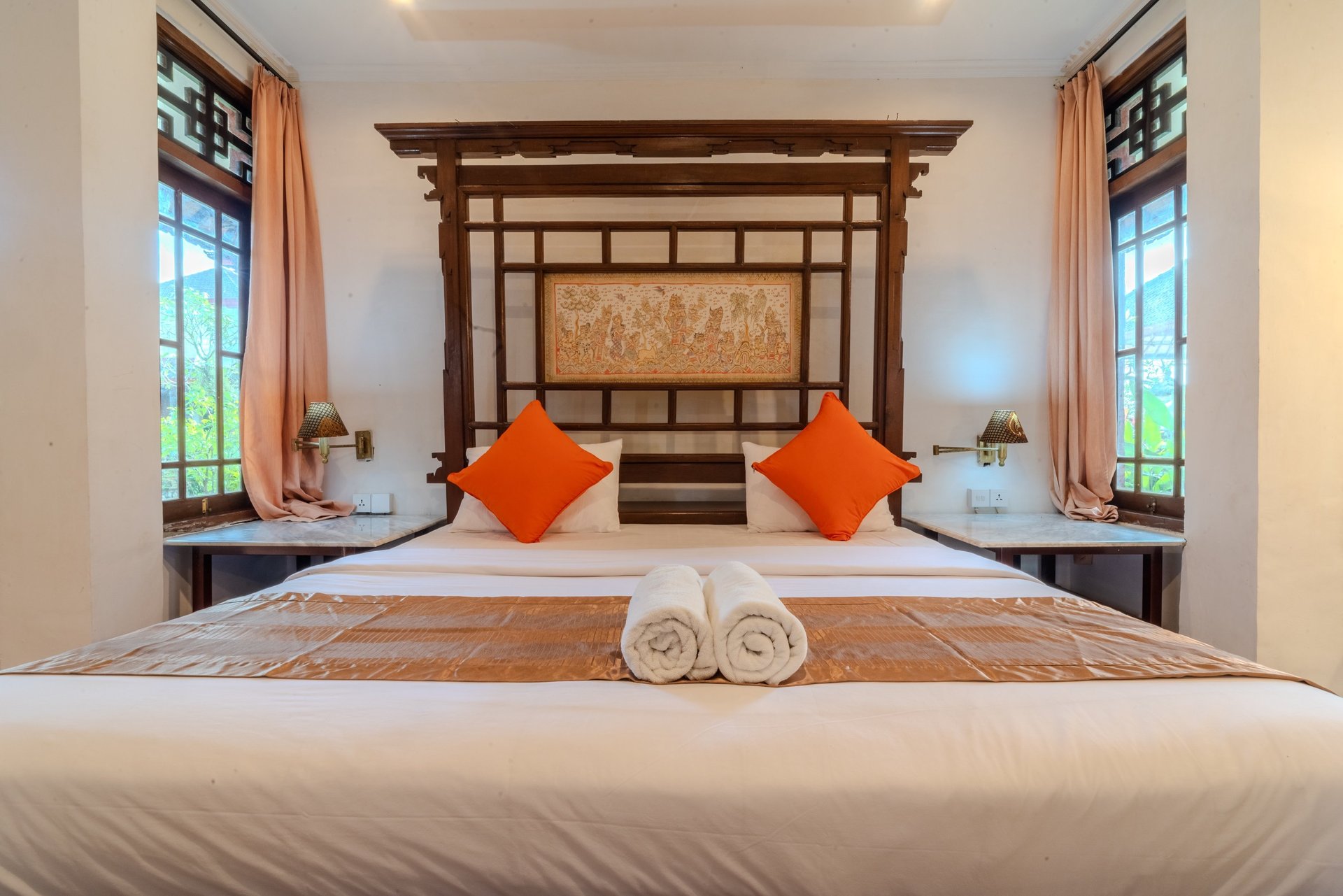 woman wearing yellow long-sleeved dress under white clouds and blue sky during daytime