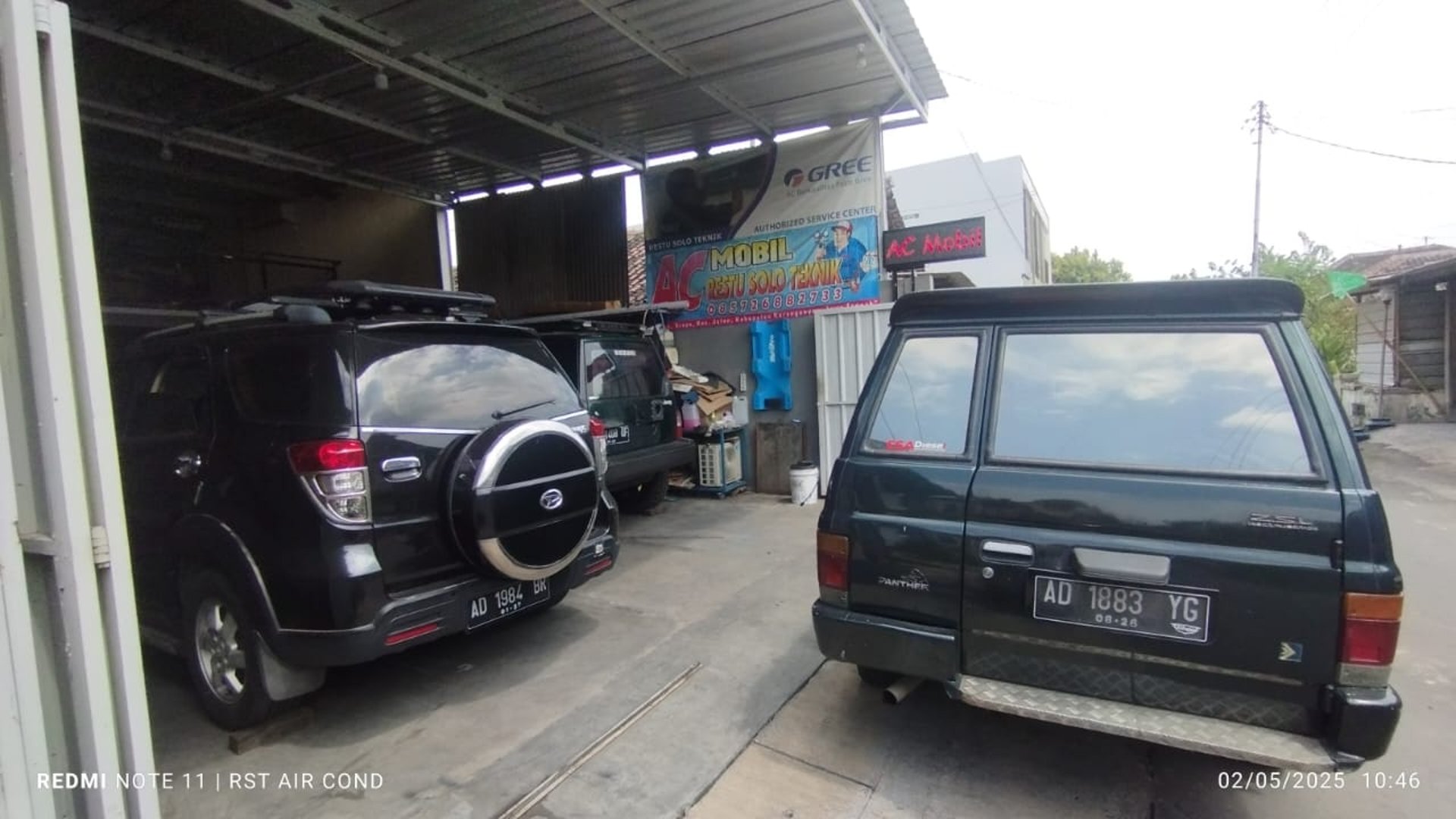 black and brown leather padded tub sofa