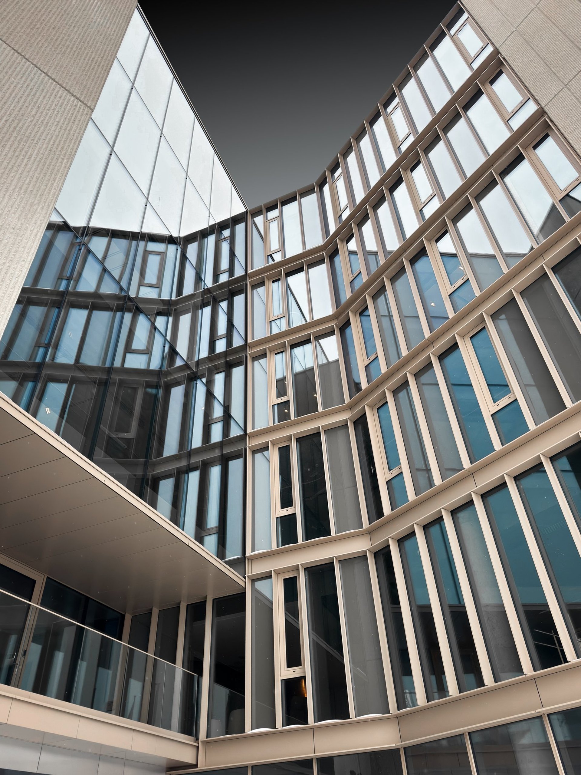 black and brown leather padded tub sofa