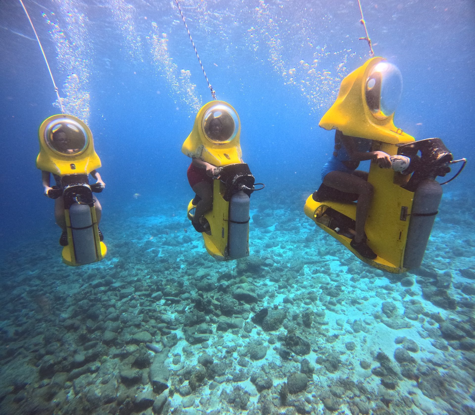woman wearing yellow long-sleeved dress under white clouds and blue sky during daytime