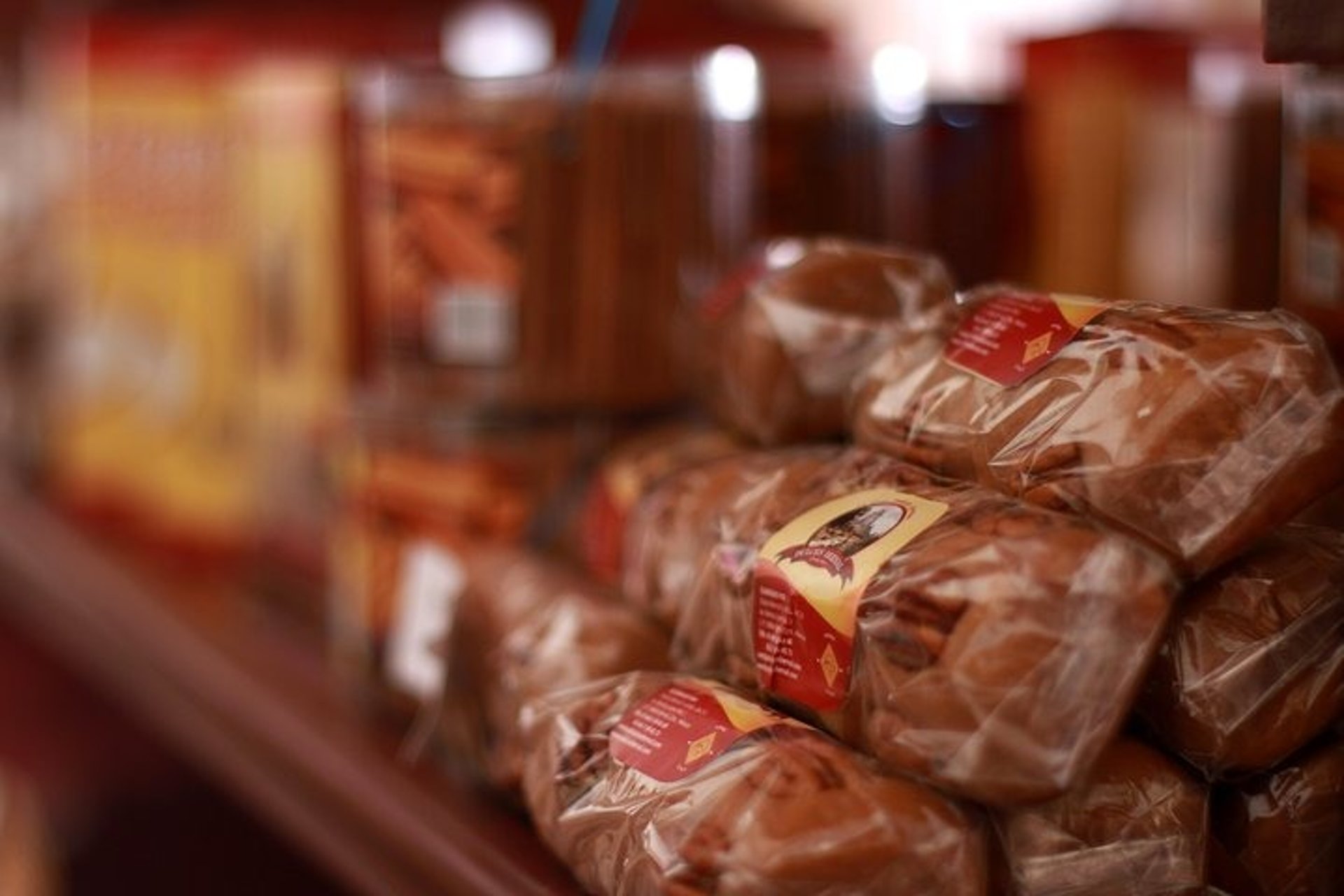 woman wearing yellow long-sleeved dress under white clouds and blue sky during daytime
