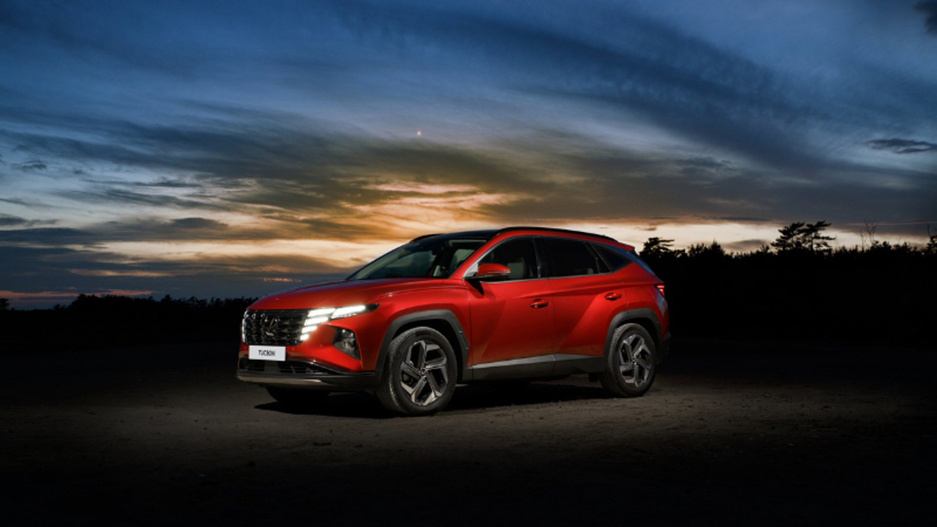 black and brown leather padded tub sofa