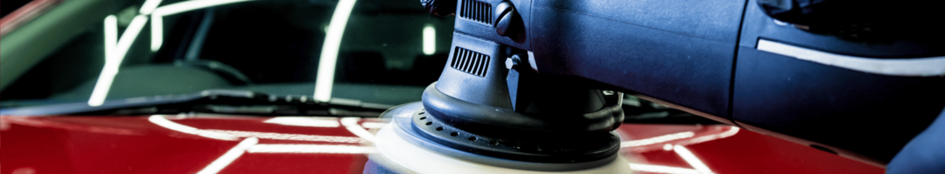 a black sports car parked in a garage