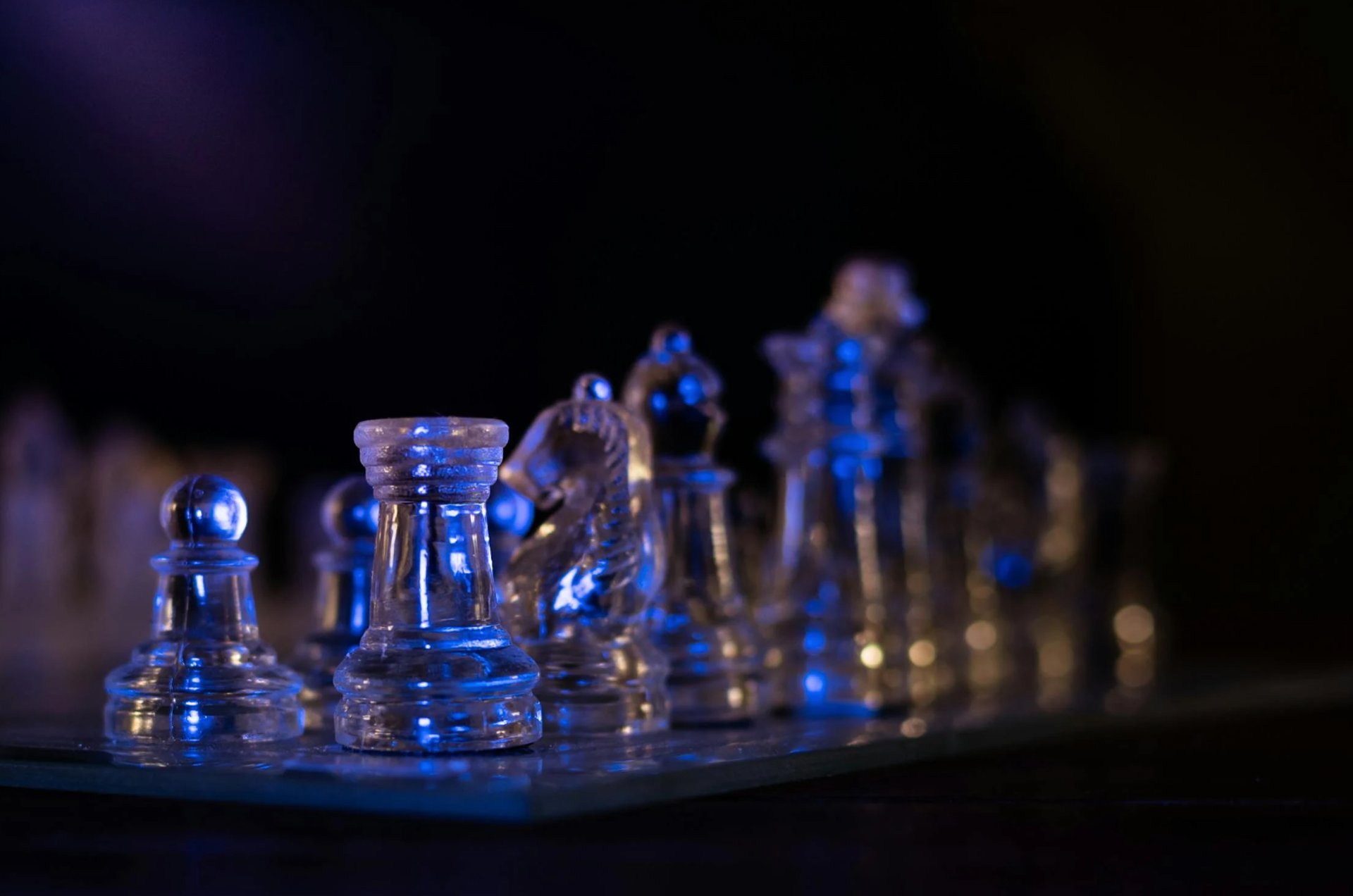 an abstract photo of a curved building with a blue sky in the background