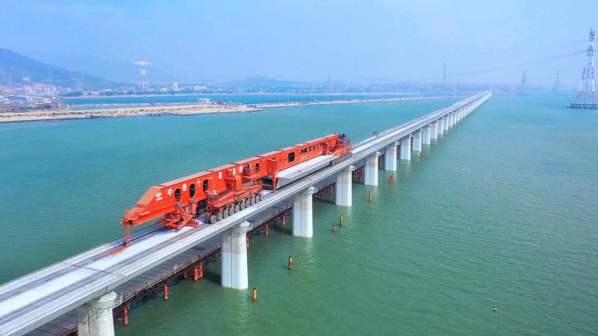an abstract photo of a curved building with a blue sky in the background