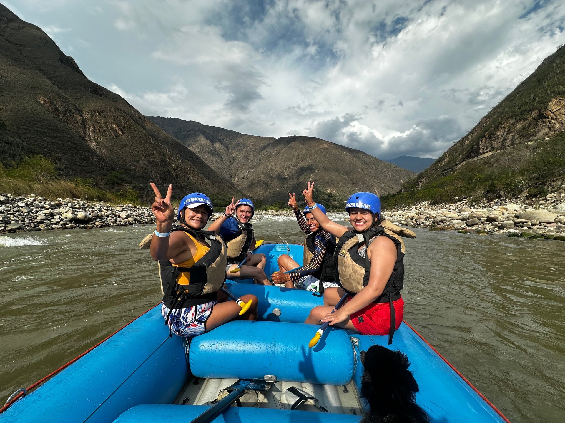 woman wearing yellow long-sleeved dress under white clouds and blue sky during daytime