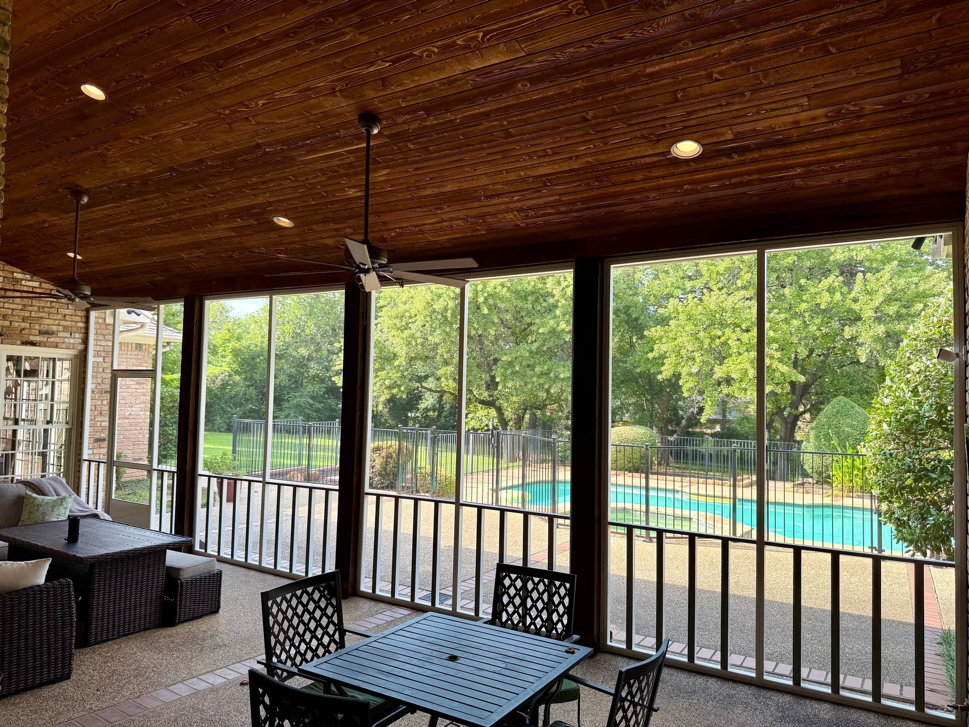 an abstract photo of a curved building with a blue sky in the background