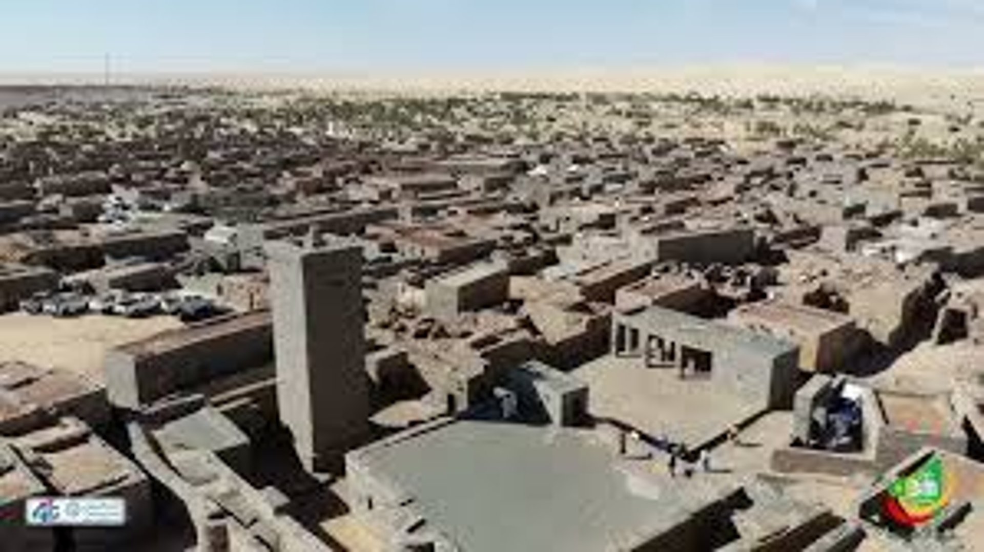 an abstract photo of a curved building with a blue sky in the background