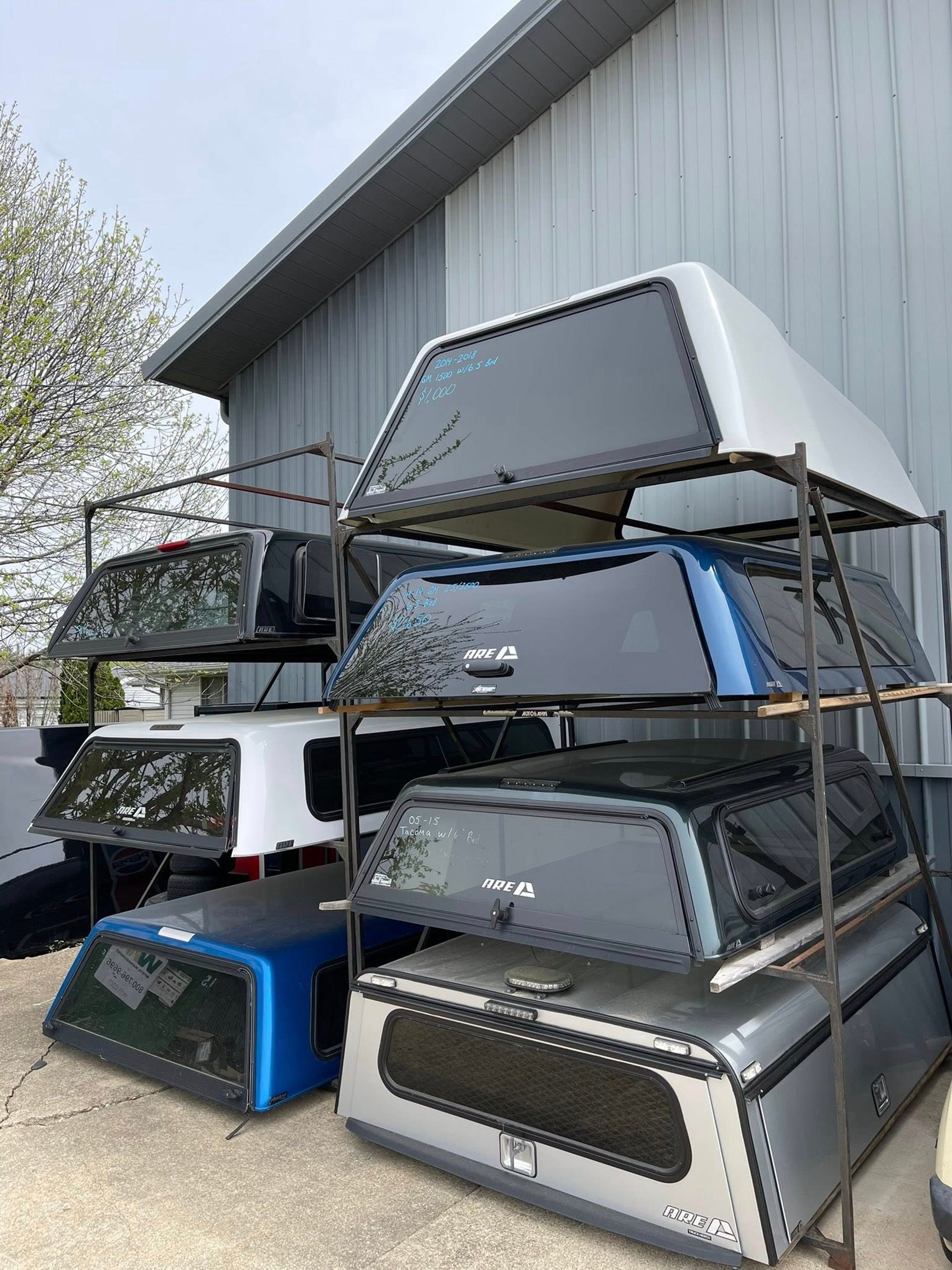 an abstract photo of a curved building with a blue sky in the background