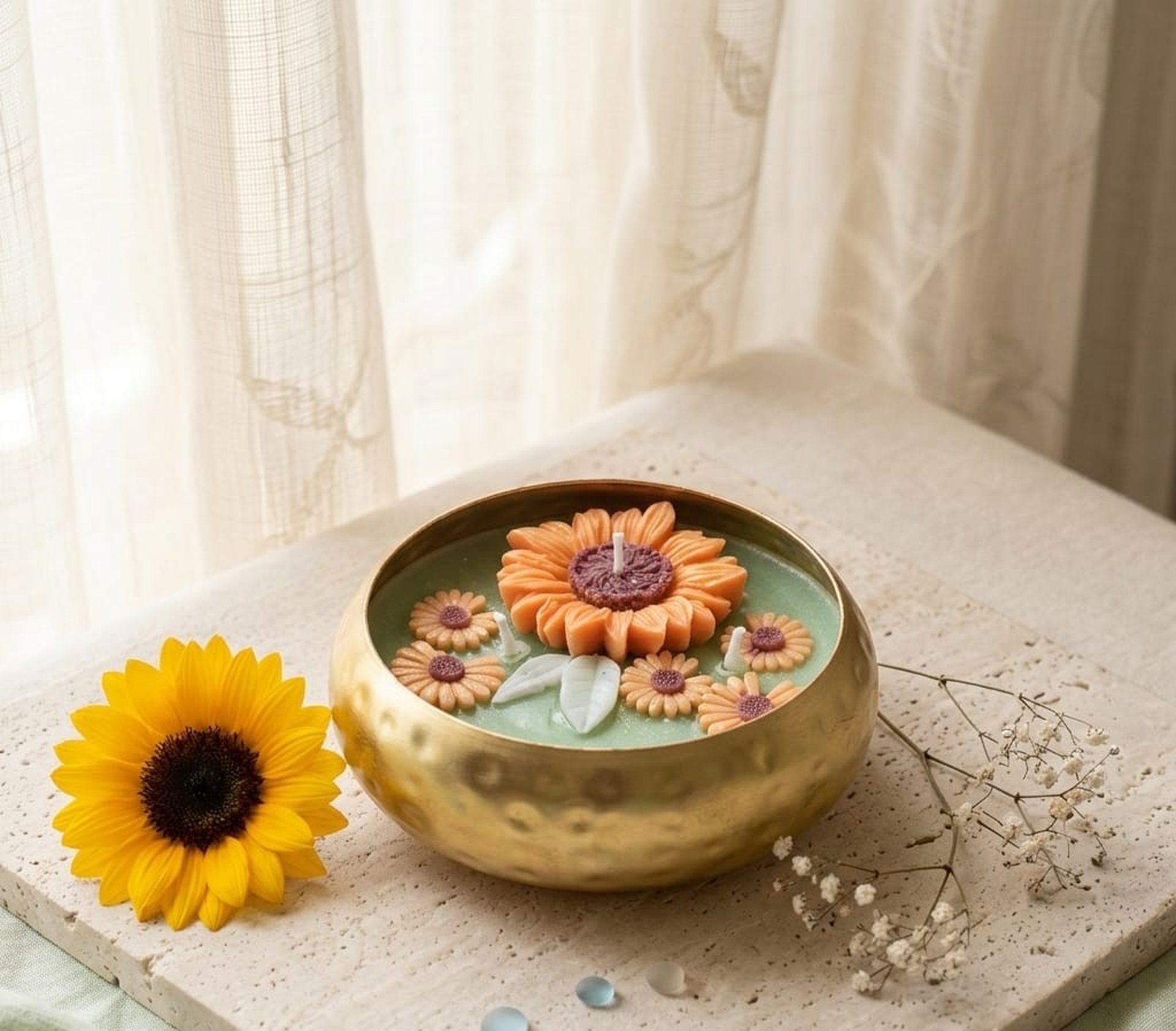 a candle and a candle holder on a table
