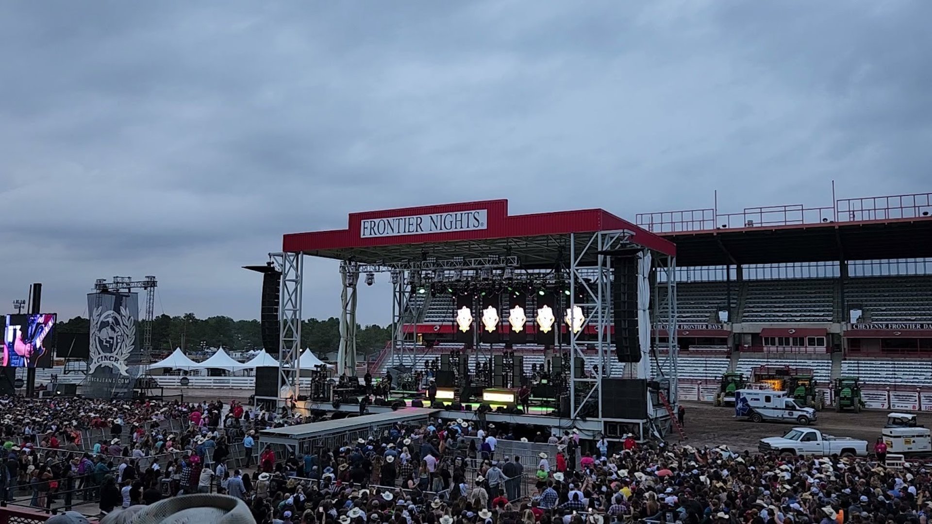 woman wearing yellow long-sleeved dress under white clouds and blue sky during daytime