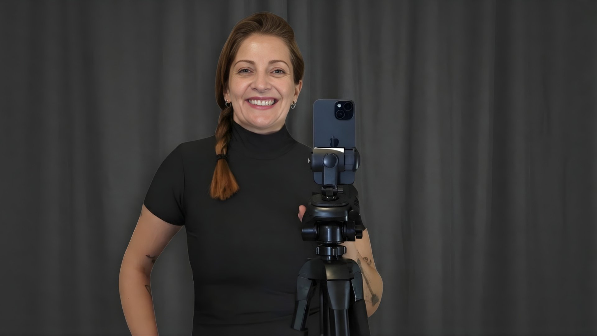 a close up of a cell phone with a camera attached to it