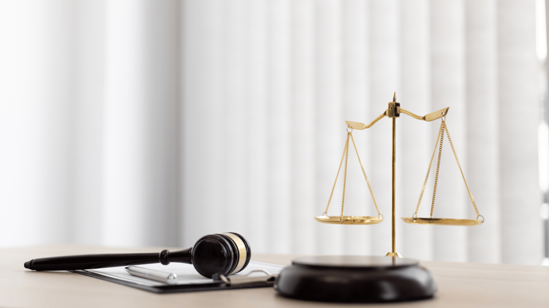 gold angel figurine on white surface