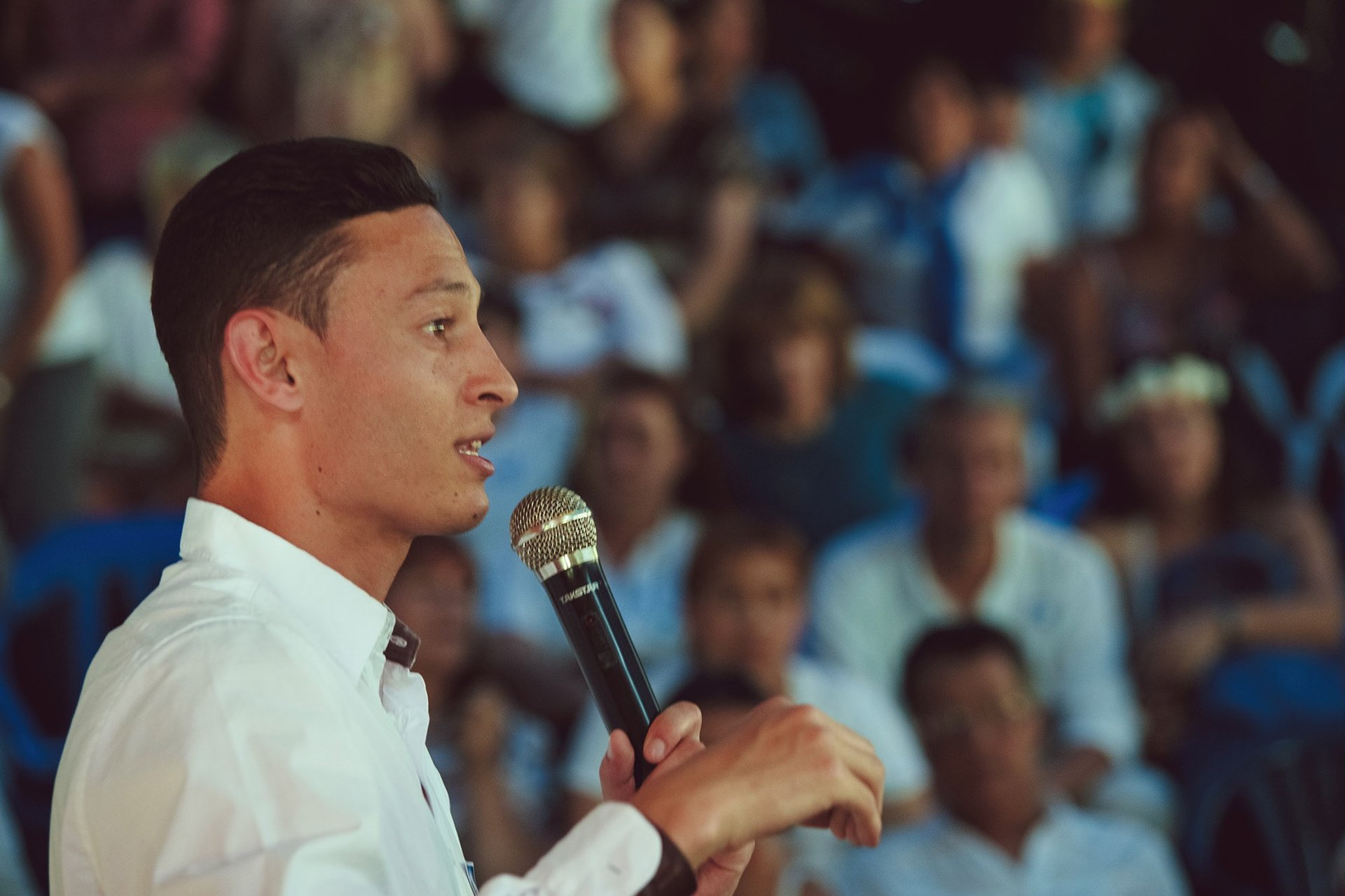 woman wearing yellow long-sleeved dress under white clouds and blue sky during daytime