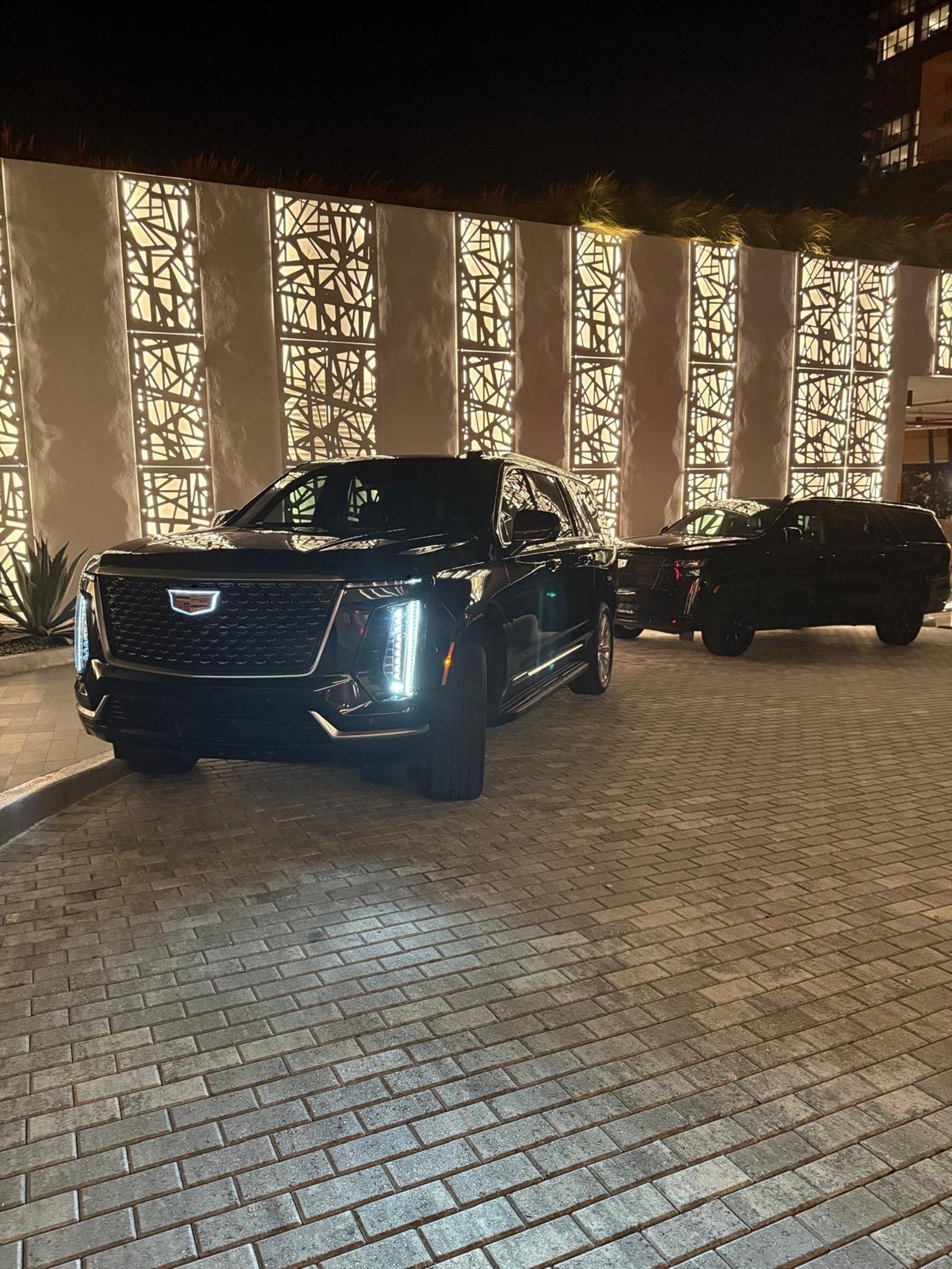 black and brown leather padded tub sofa