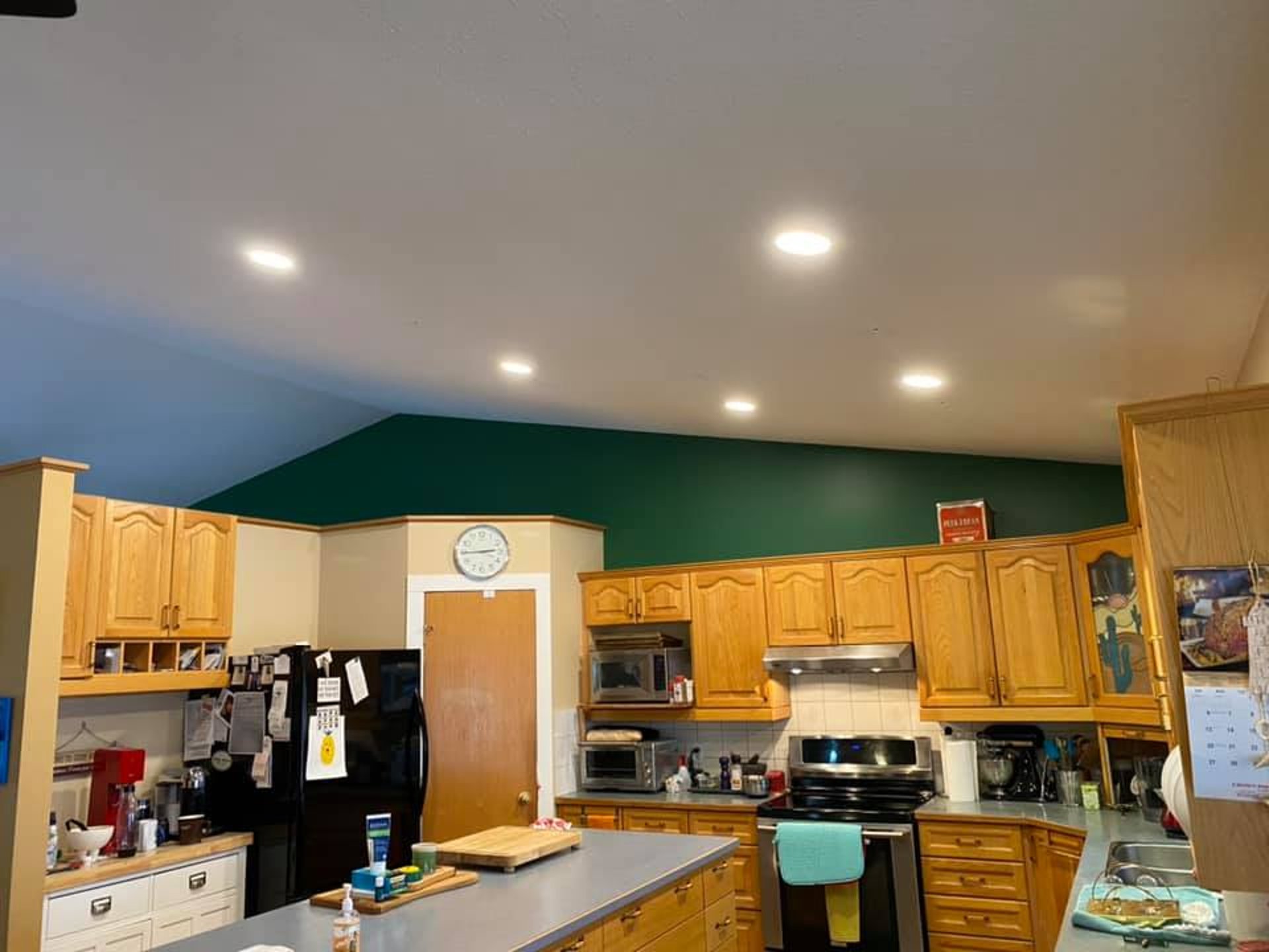 white wooden cabinet near window