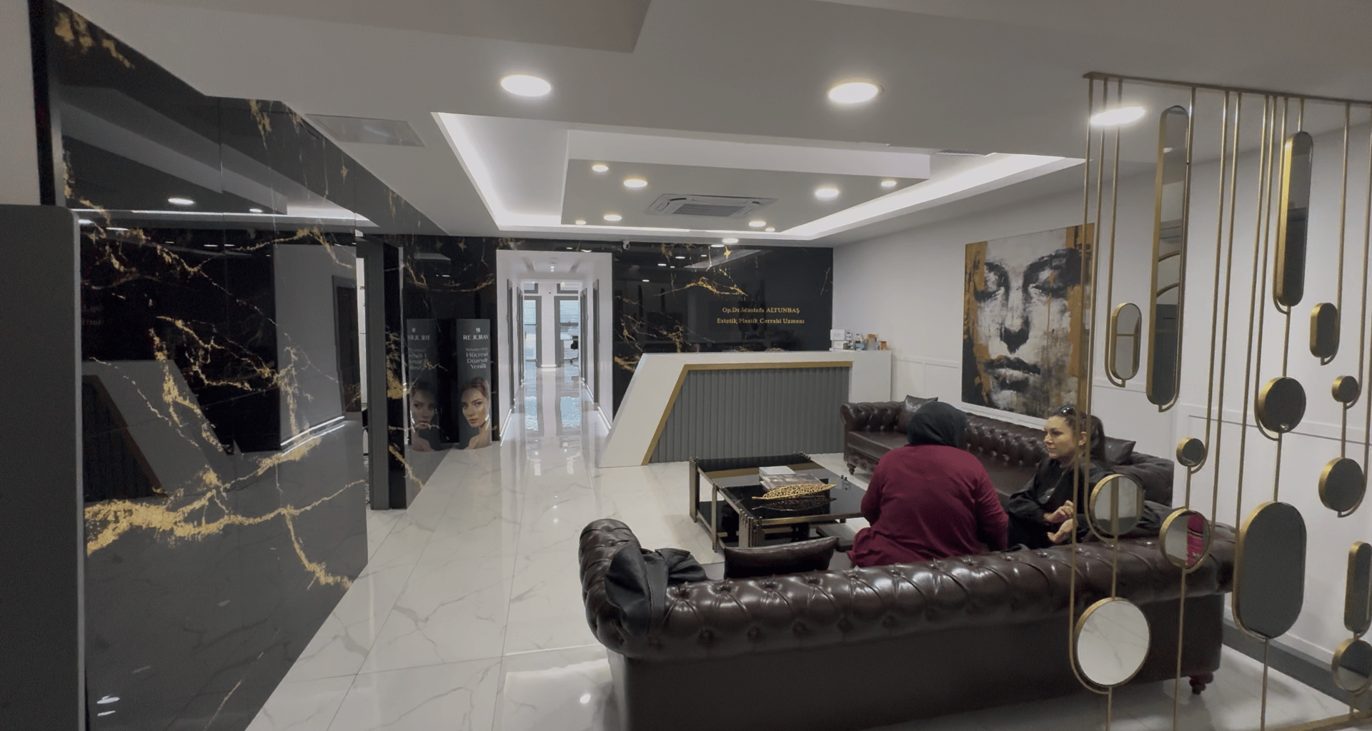 black and brown leather padded tub sofa