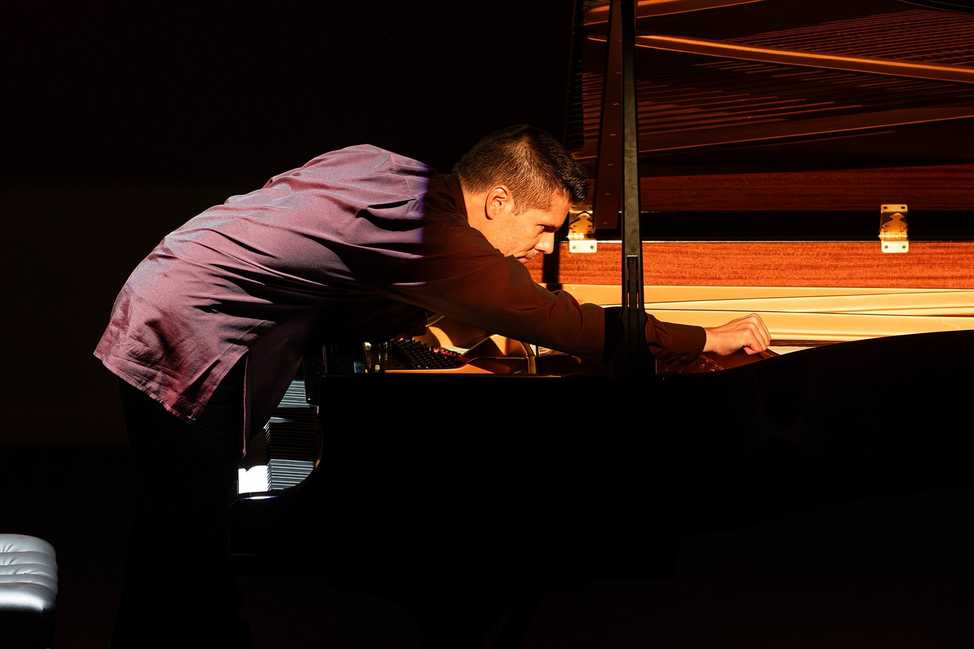 woman wearing yellow long-sleeved dress under white clouds and blue sky during daytime