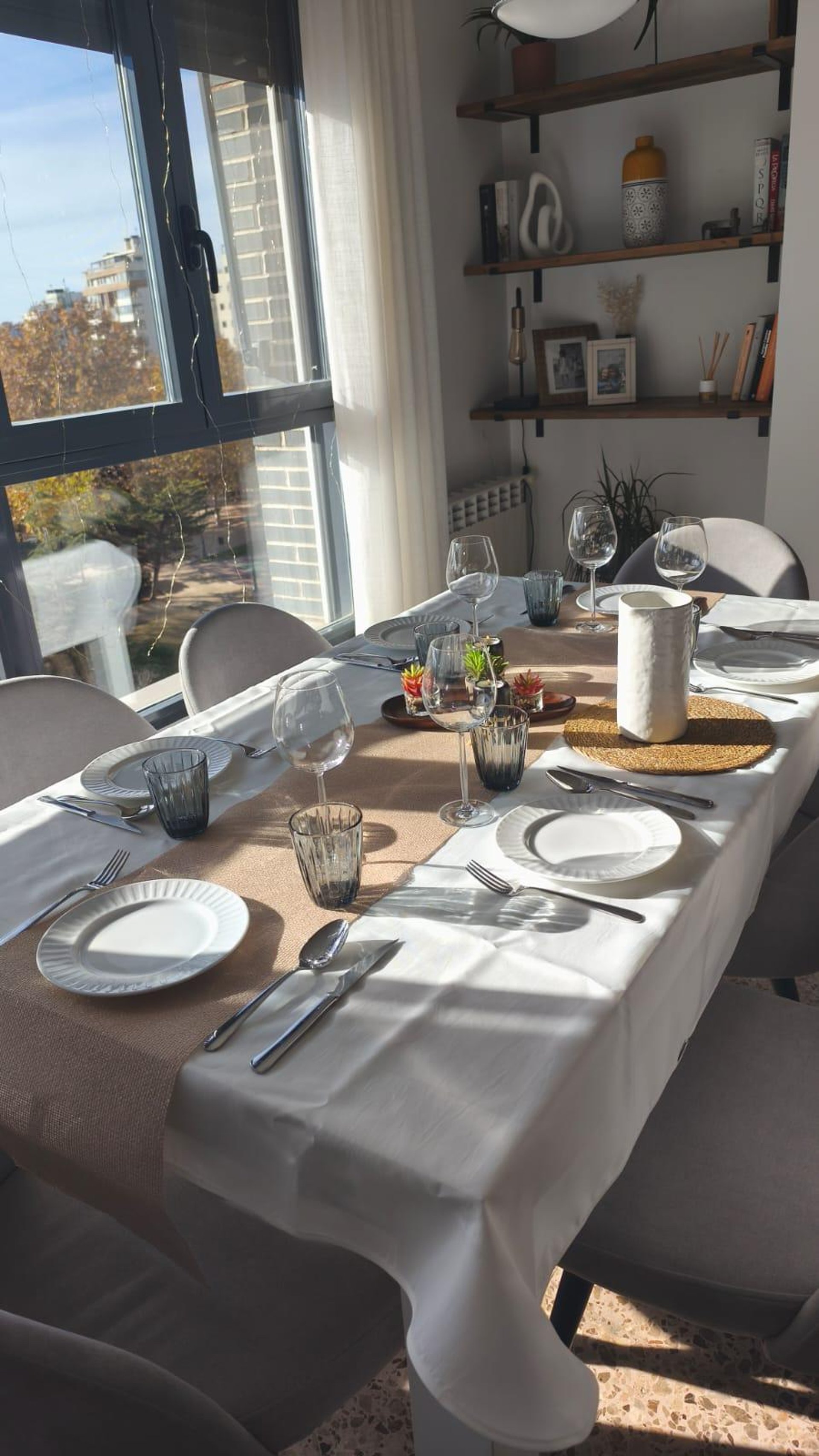an abstract photo of a curved building with a blue sky in the background