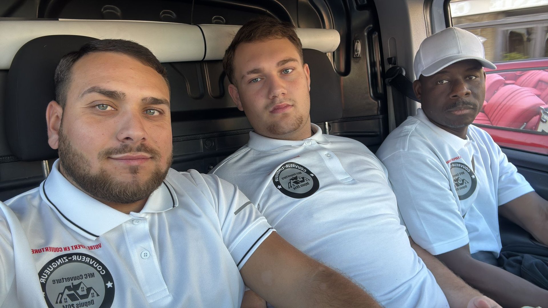 A roof with a birdhouse on top of it