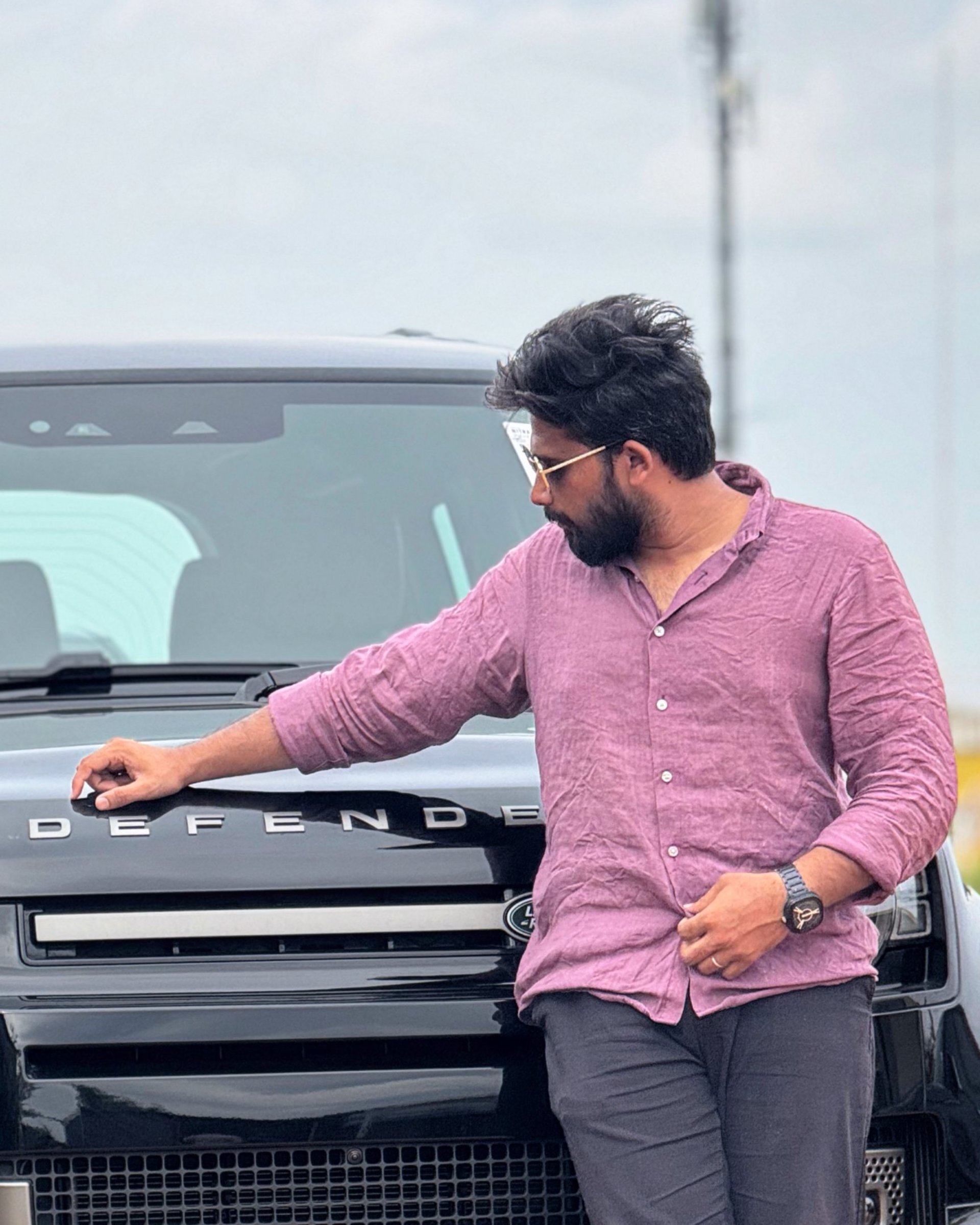 person wearing grey knit sweater