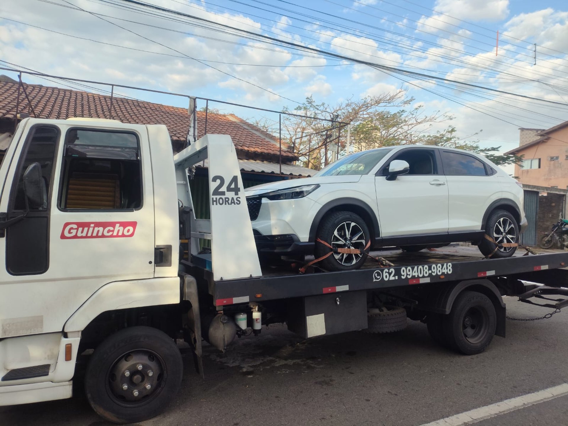 woman wearing yellow long-sleeved dress under white clouds and blue sky during daytime