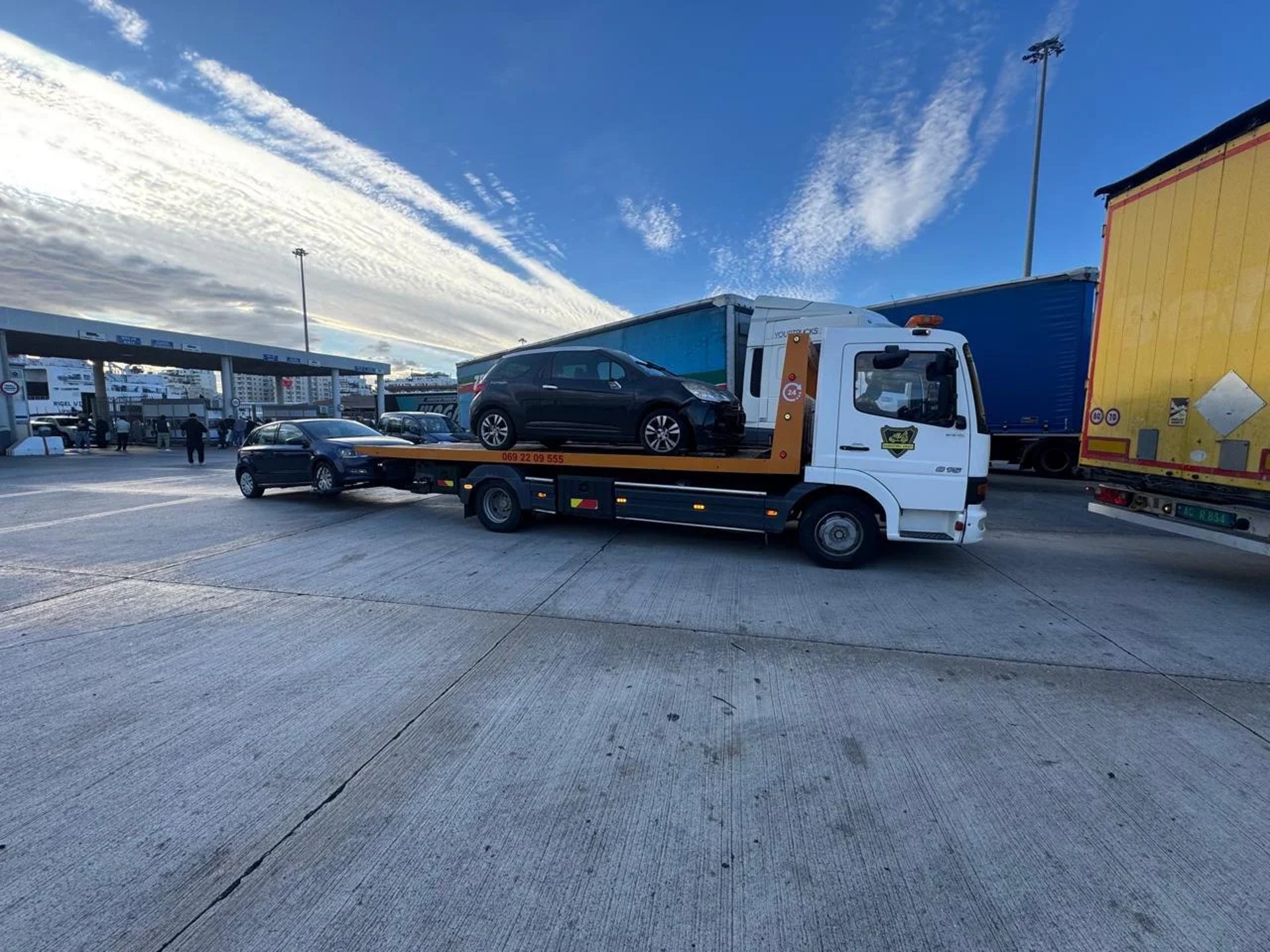 black and brown leather padded tub sofa