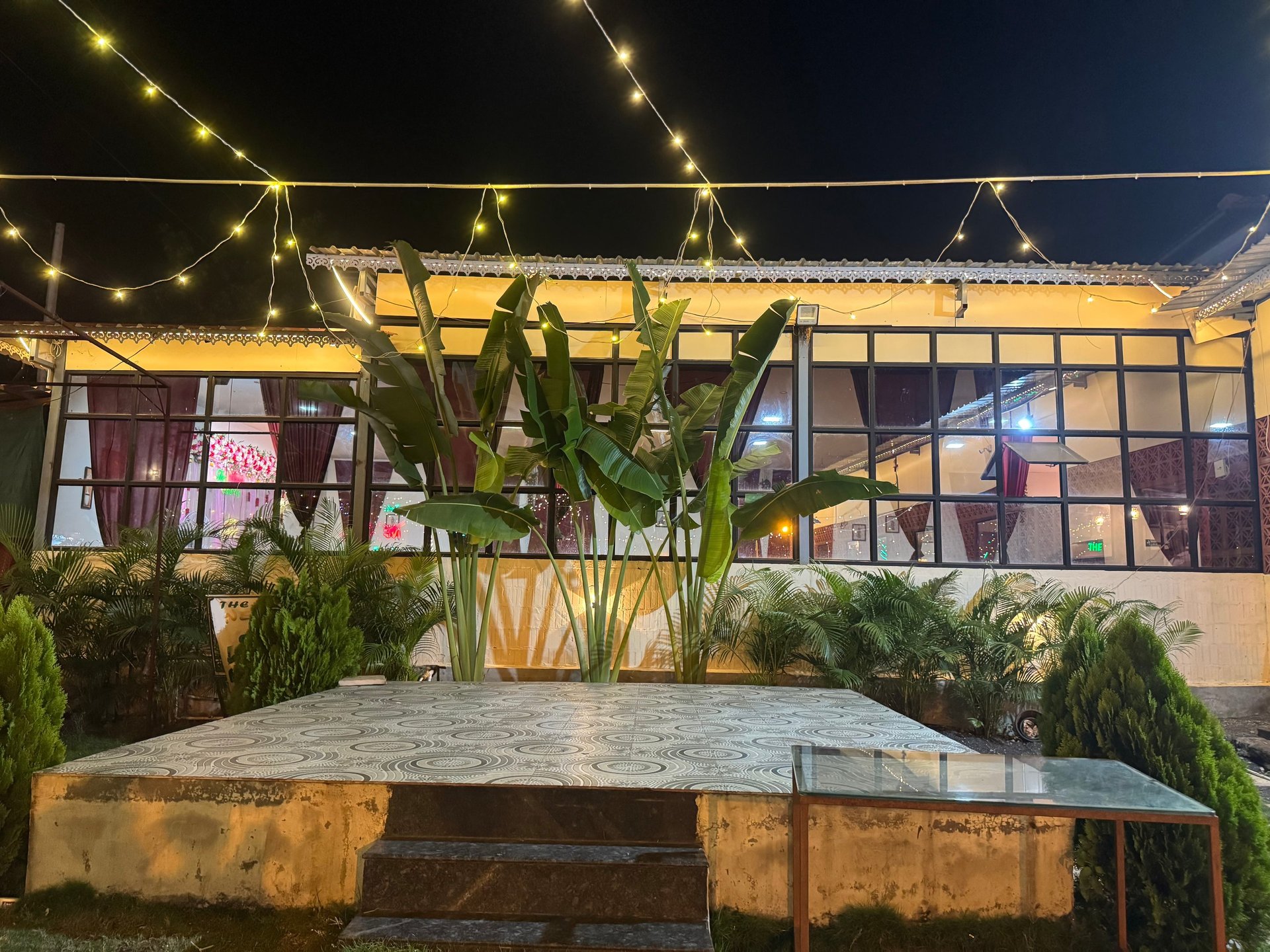 woman wearing yellow long-sleeved dress under white clouds and blue sky during daytime
