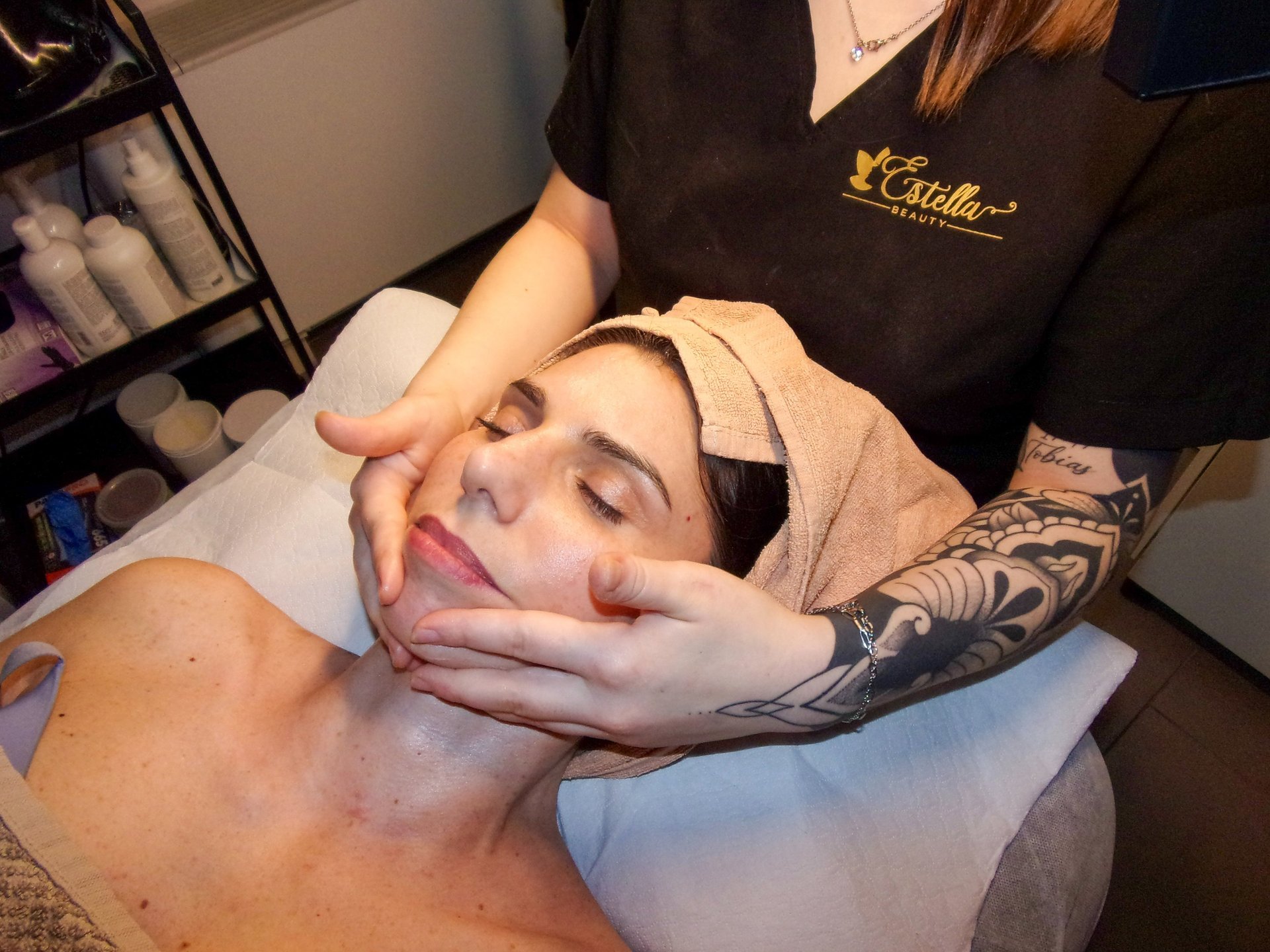 black and brown leather padded tub sofa