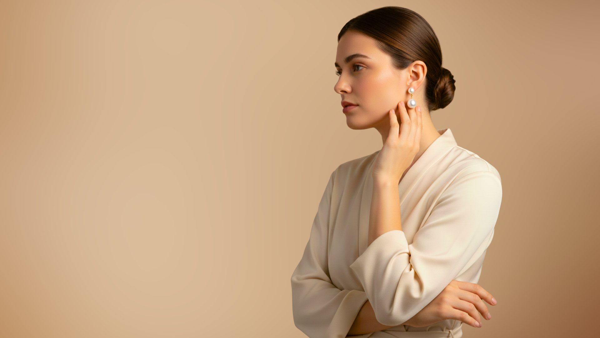 a close up of a necklace on a white sheet