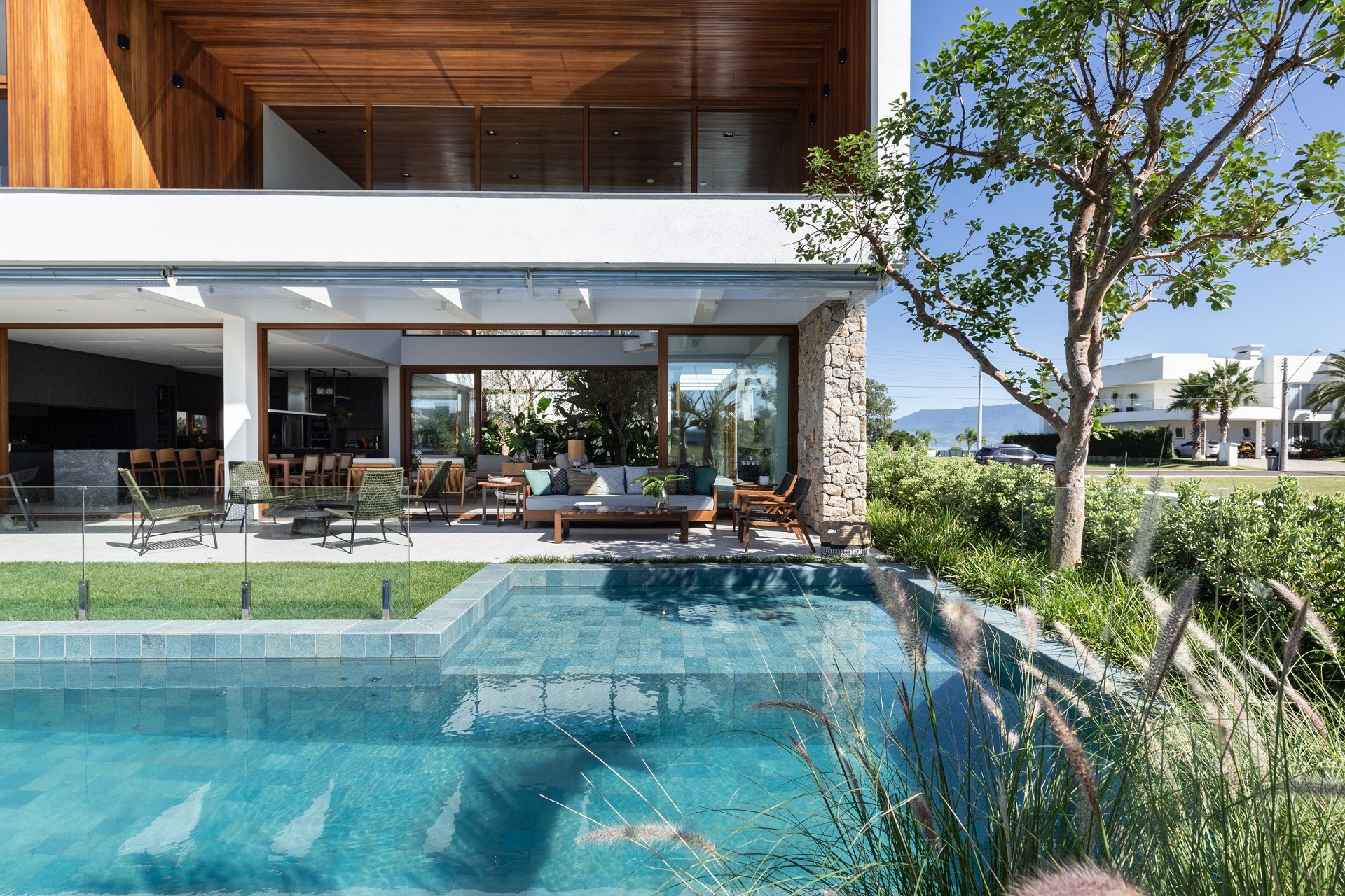 woman wearing yellow long-sleeved dress under white clouds and blue sky during daytime