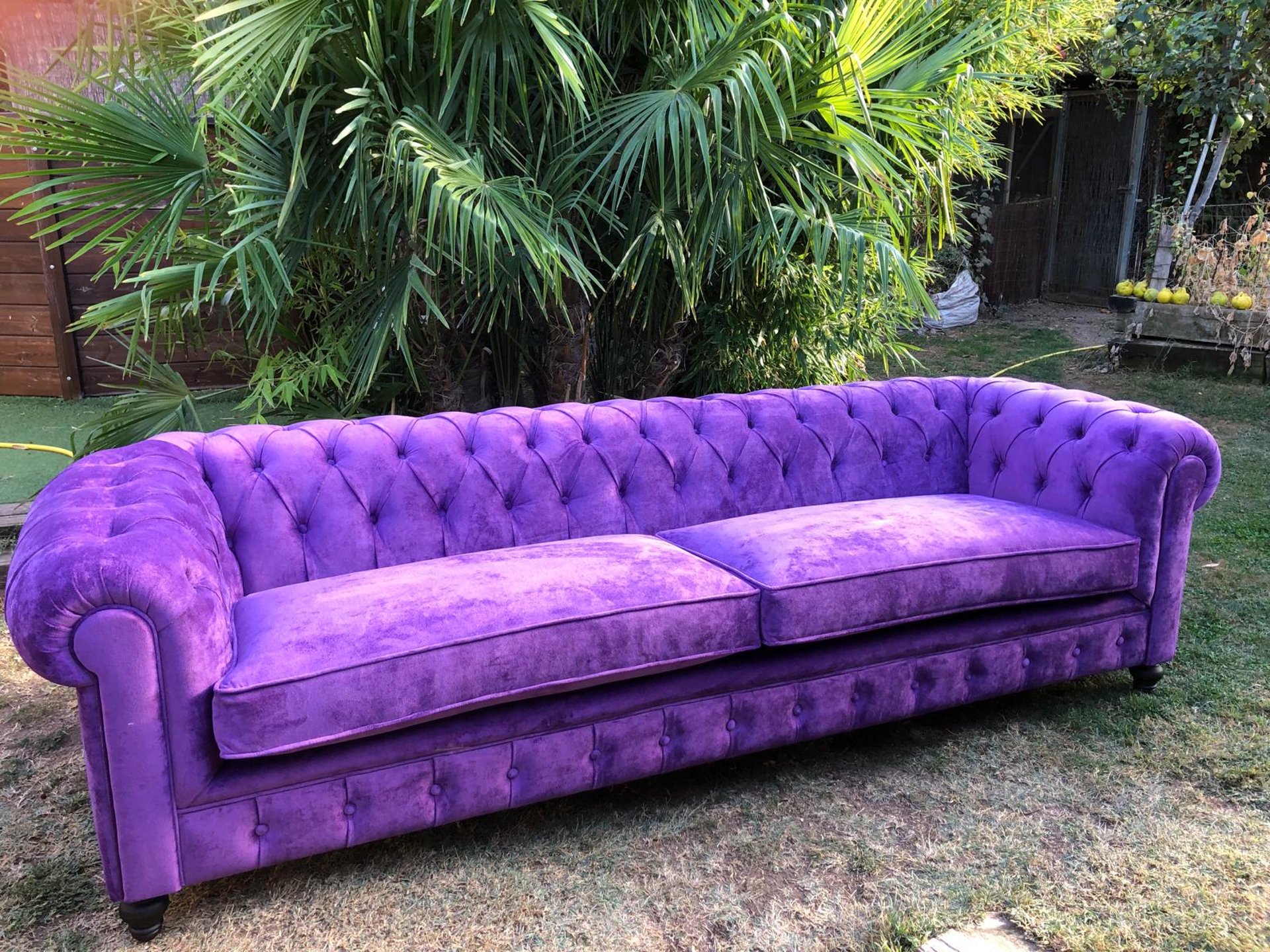 black and brown leather padded tub sofa