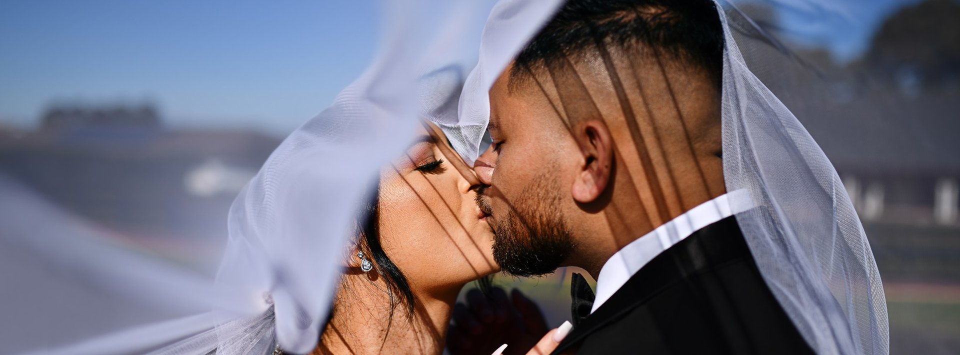 empty hallway between concrete buildings during daytime