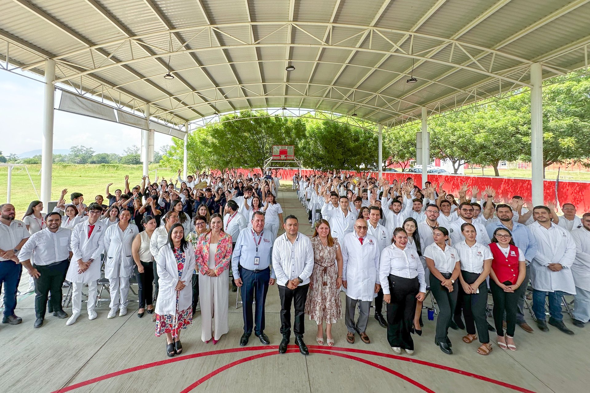 an abstract photo of a curved building with a blue sky in the background