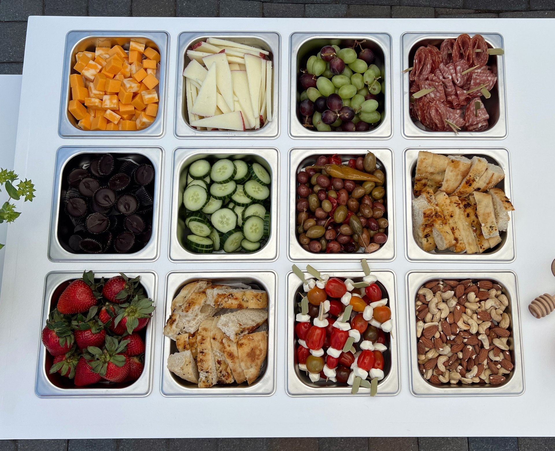 a wooden table topped with lots of food