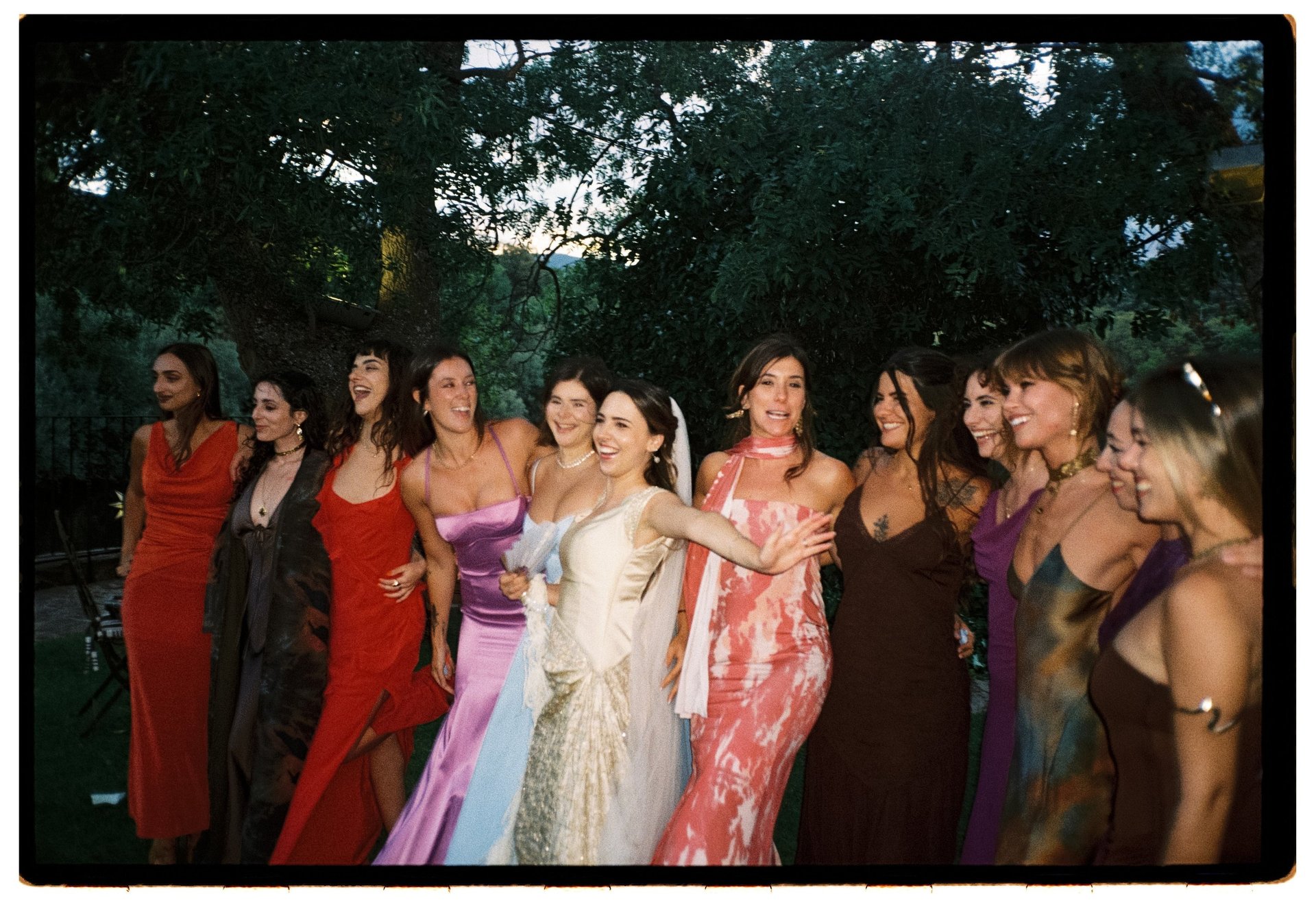 woman wearing yellow long-sleeved dress under white clouds and blue sky during daytime