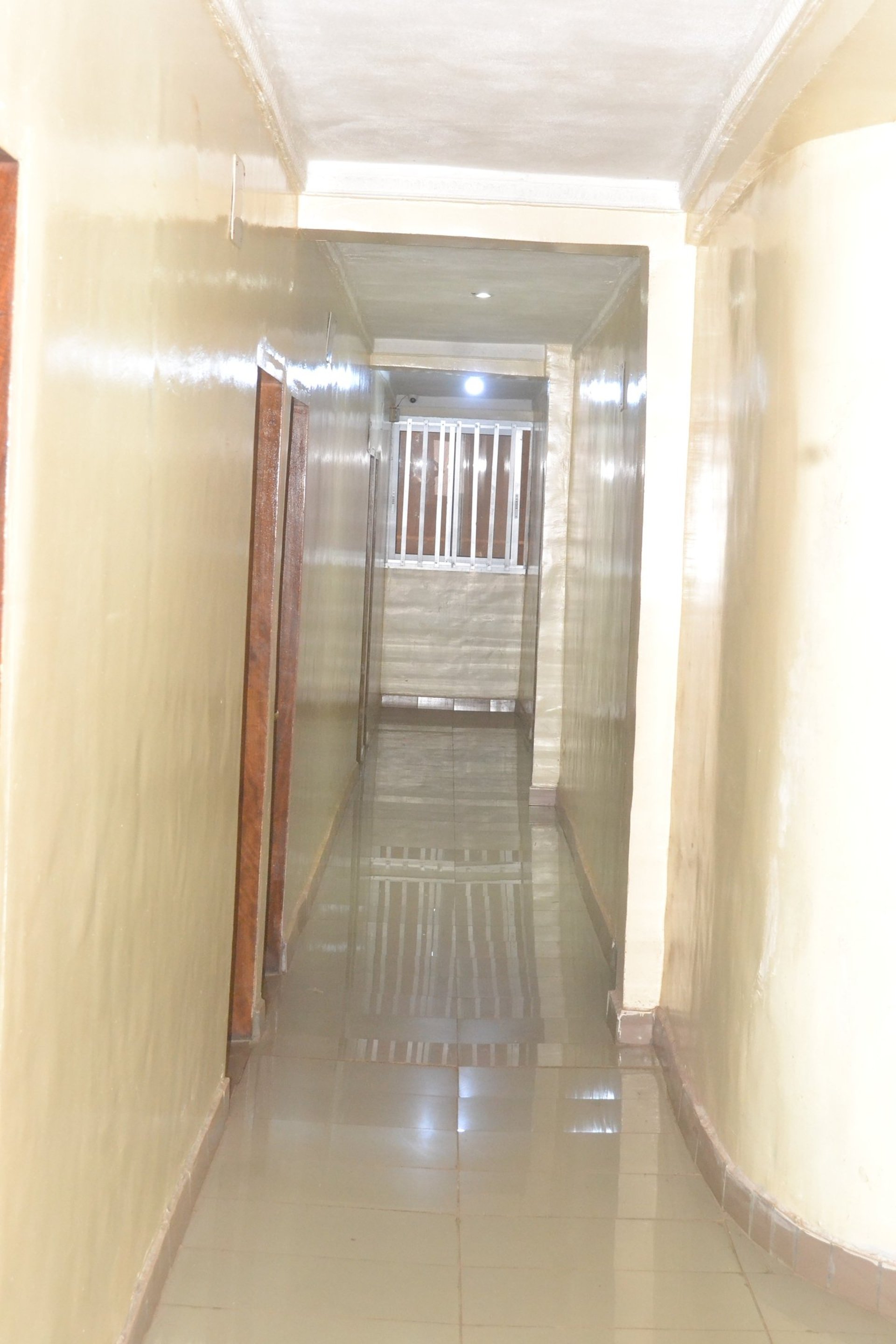 woman wearing yellow long-sleeved dress under white clouds and blue sky during daytime