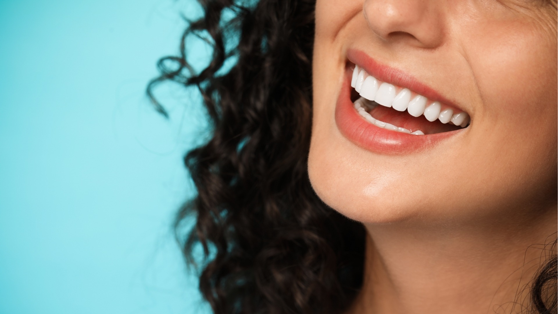 a woman with her eyes closed